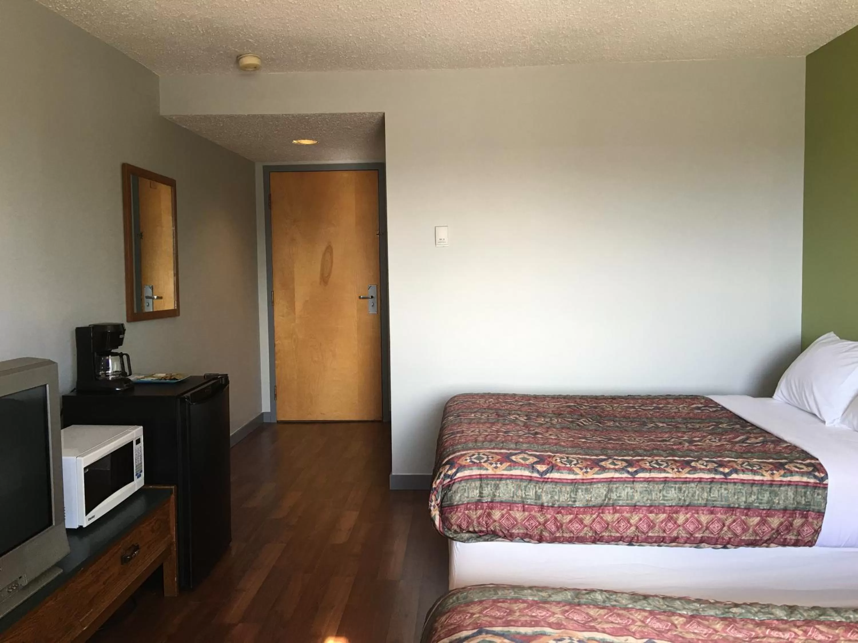 Bed in Home Away Inn