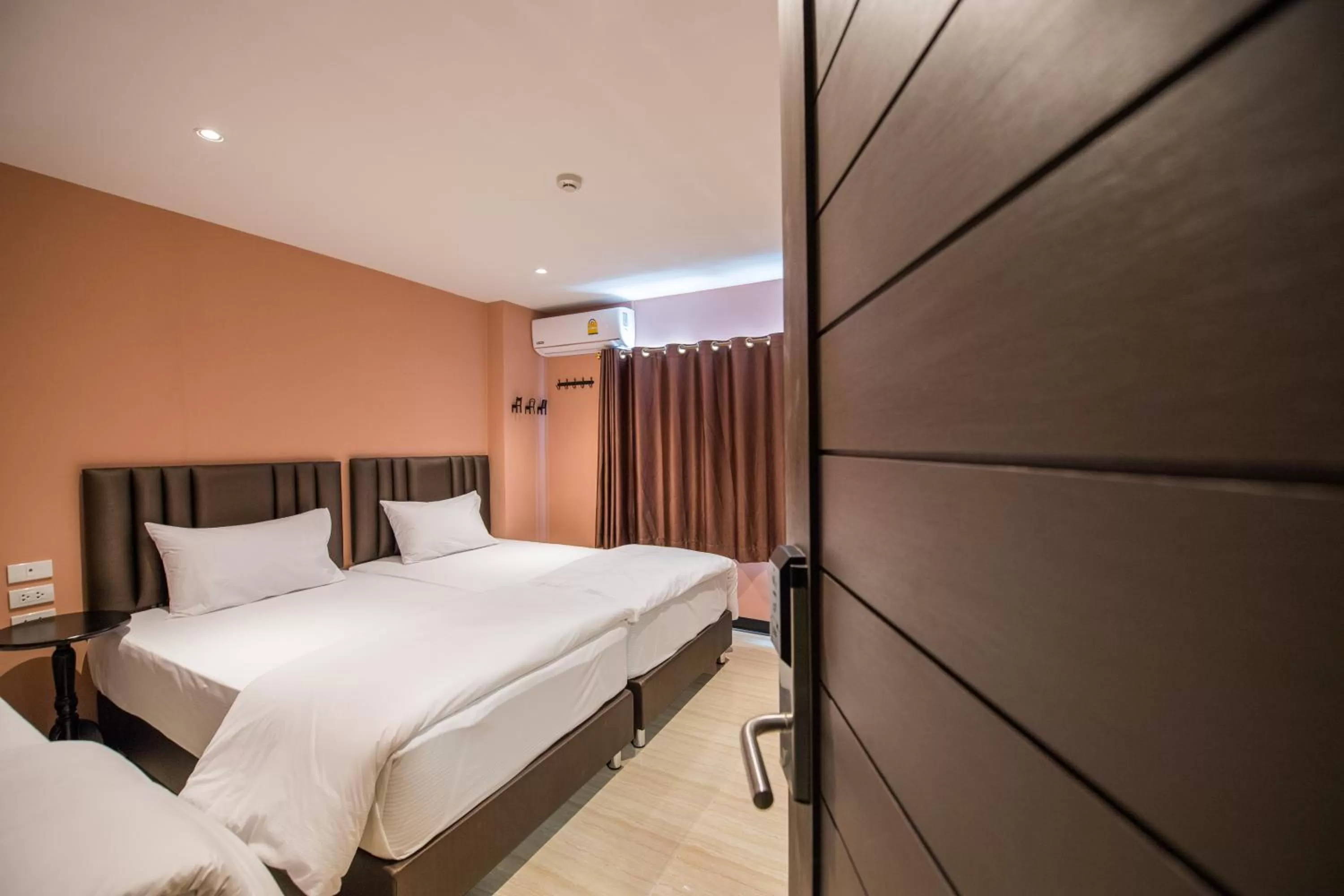 Bed in Let's Zzz Bangkok