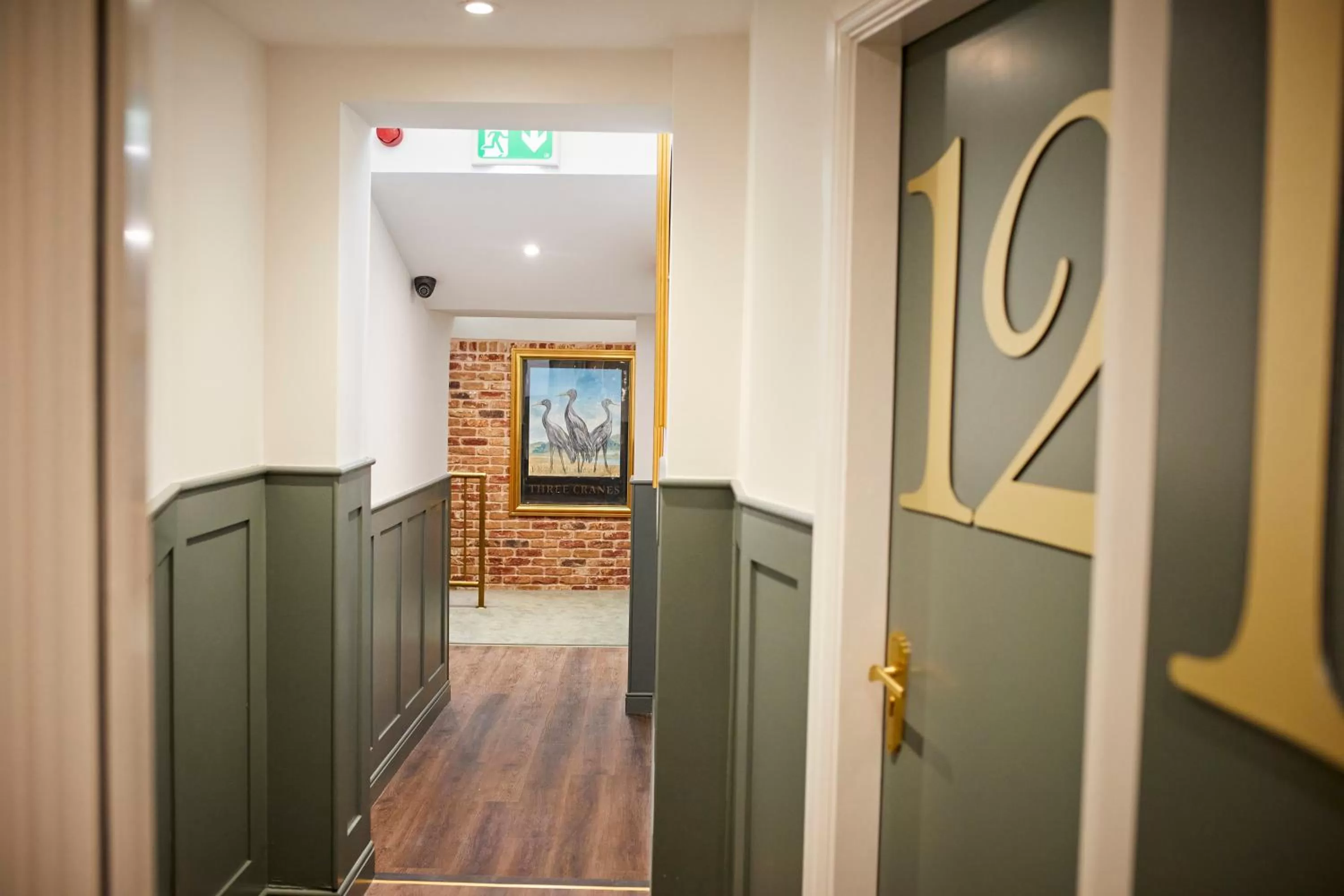 Property logo or sign in Three Cranes Serviced Apartments