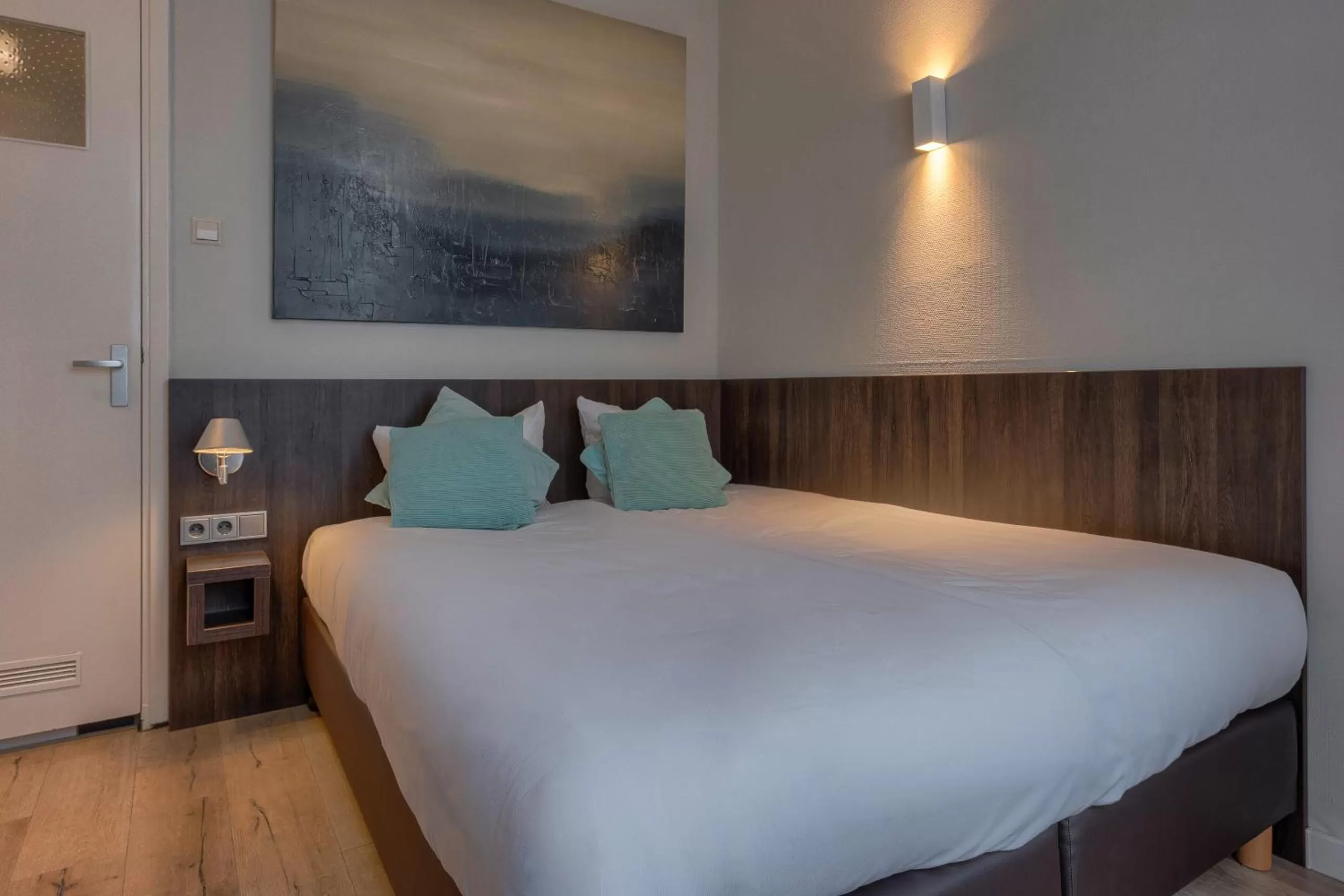 Bed in Hotel Damsquare