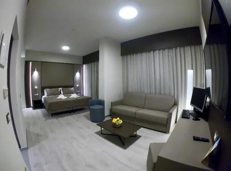 Living room, Bed in Hotel Santin