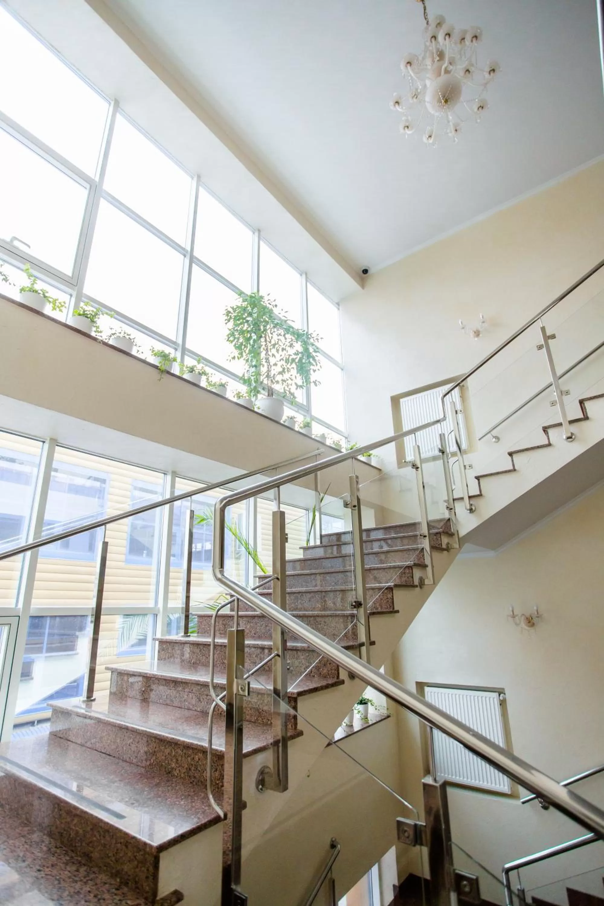 Communal lounge/ TV room in Gold Georg Palace Hotel