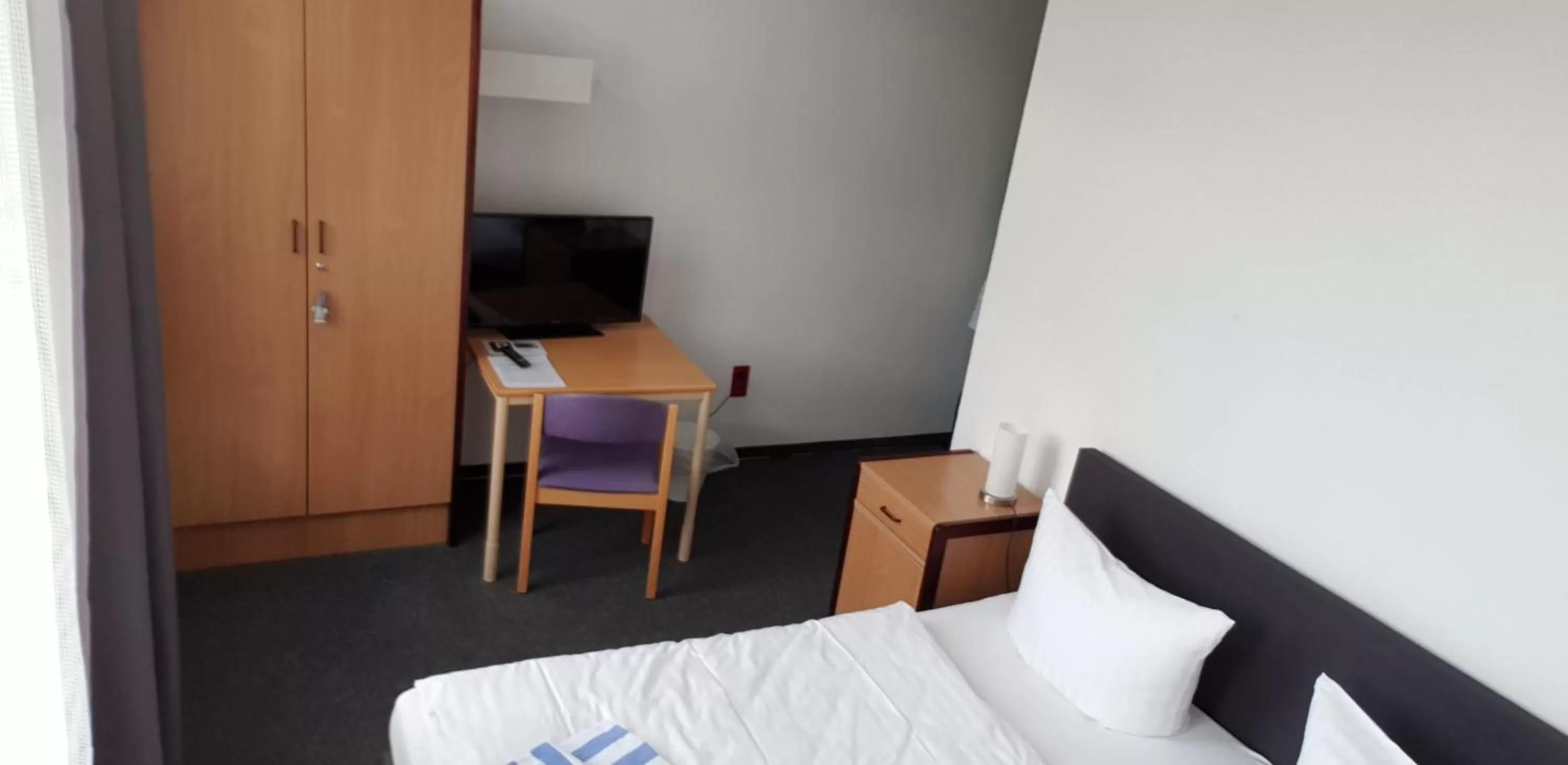 Bed in Appartement-Hotel Rostock