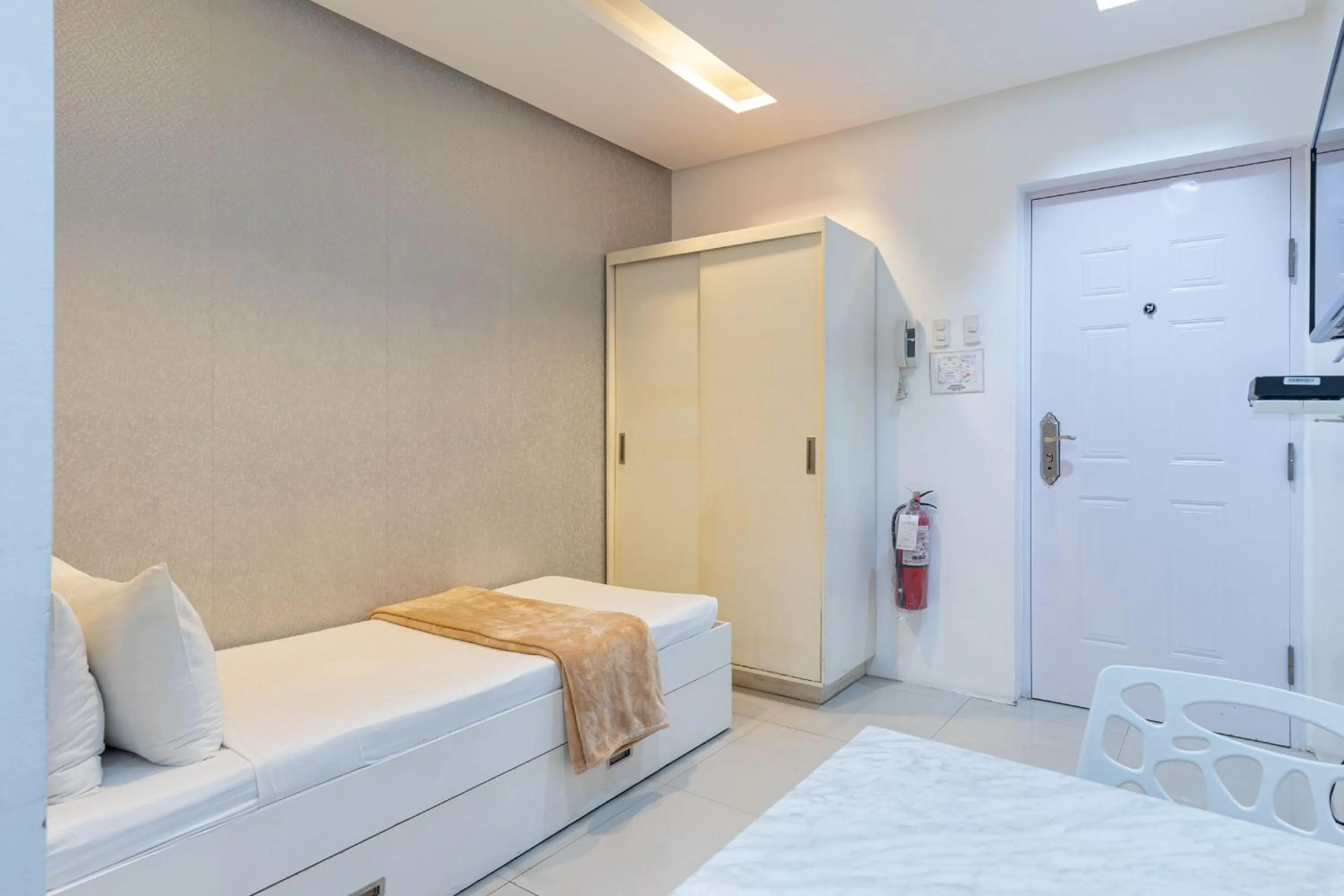 Bed in Baymont Suites & Residences