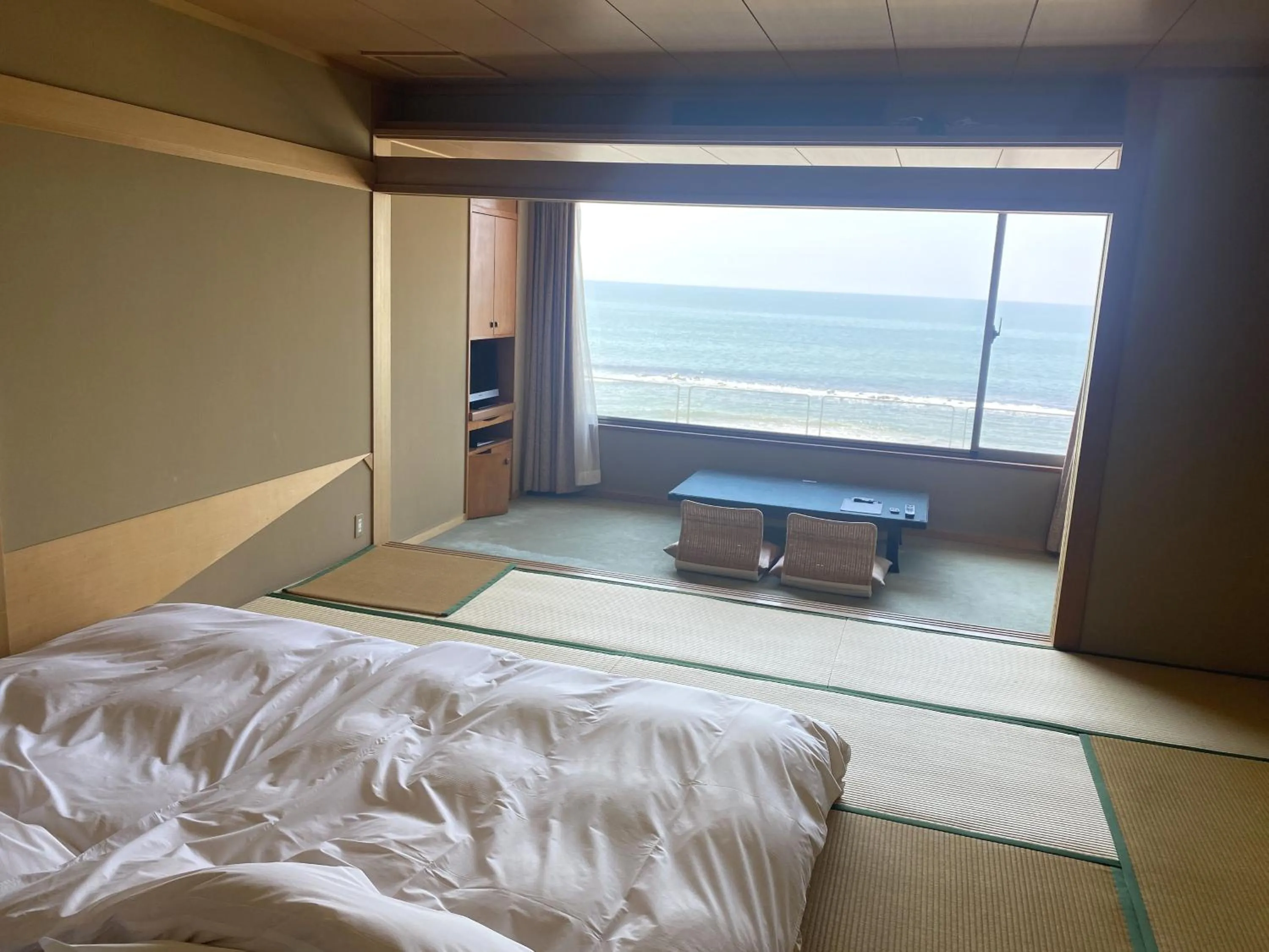 View (from property/room), Bed in Wakamatsu Hot Spring Resort