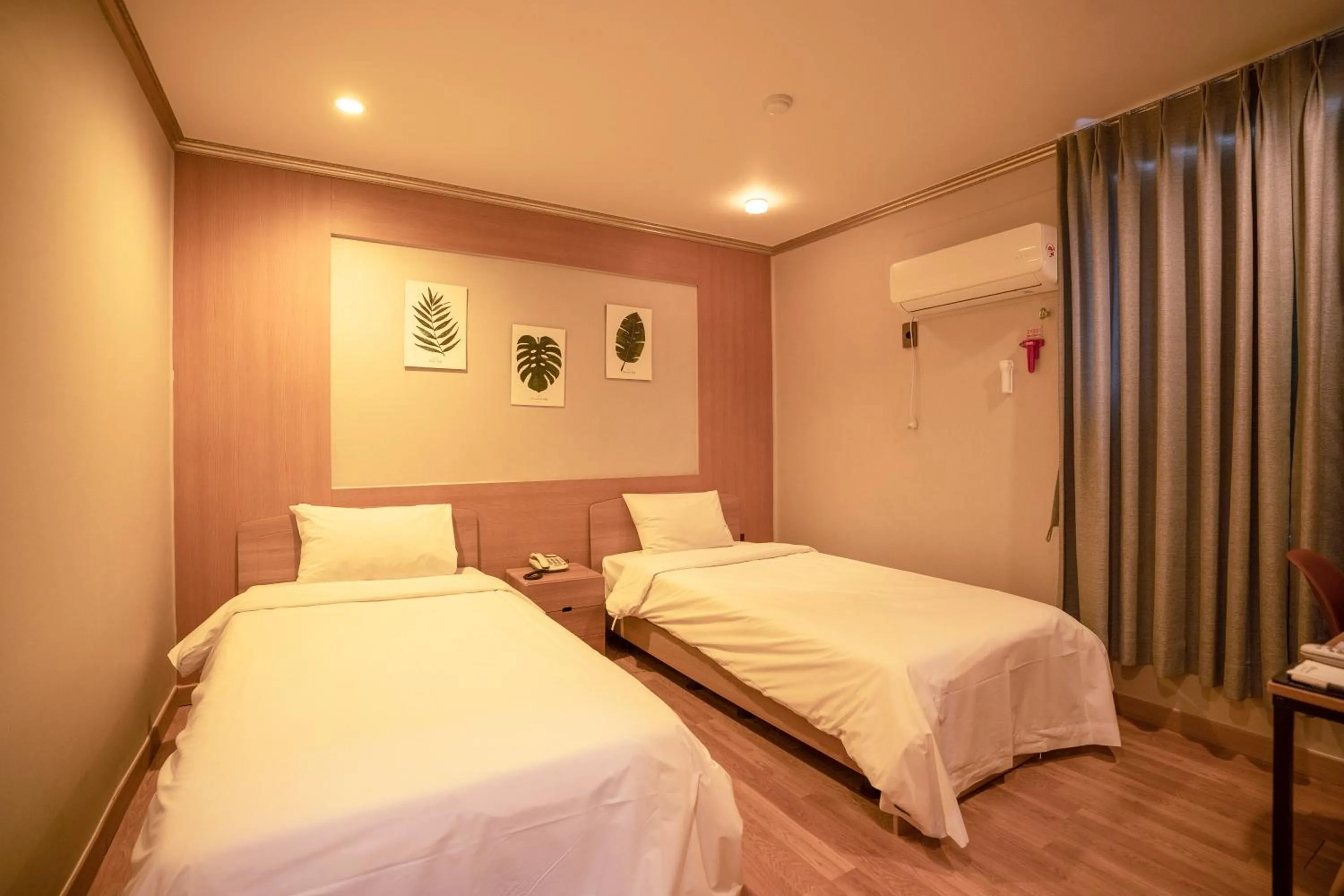 Bed in Jeju Stay Hotel