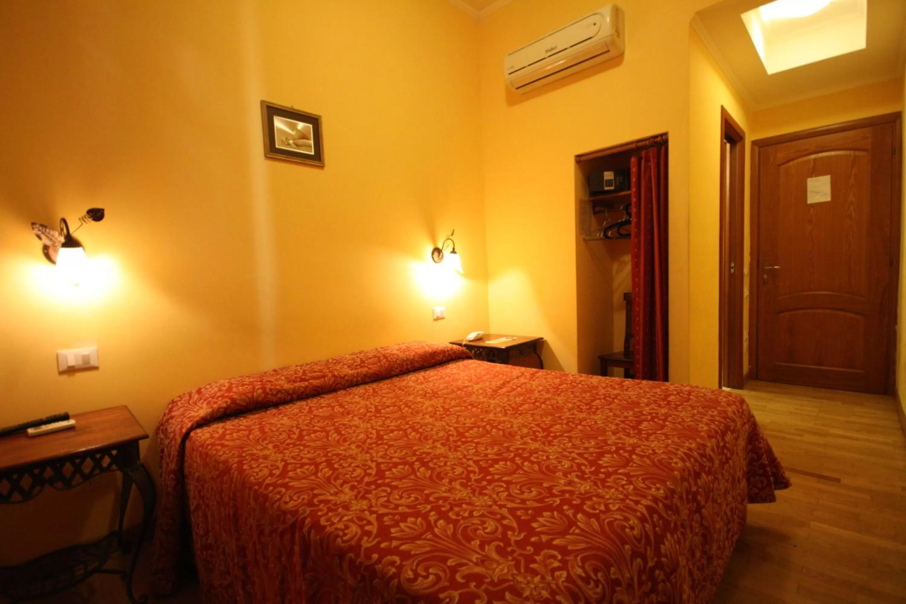 Bed in Hotel Cherubini