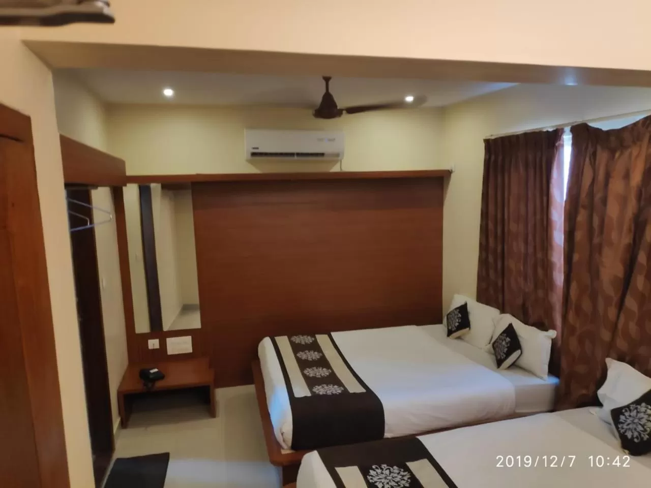 Photo of the whole room, Bed in The Grand Inn Mysore