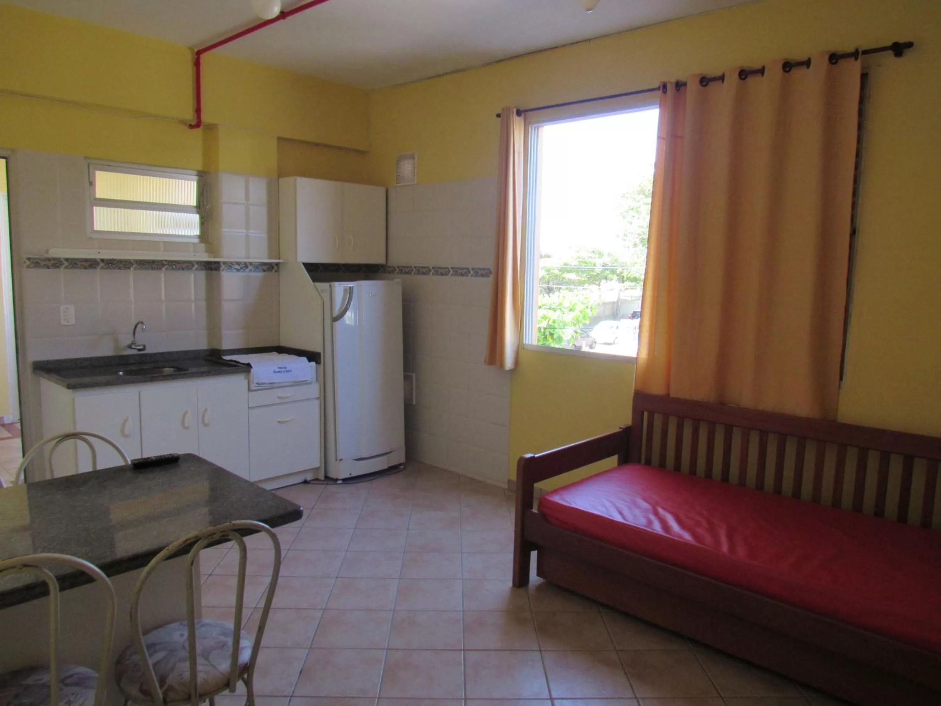 Kitchen or kitchenette in Pousada Recanto da Barra