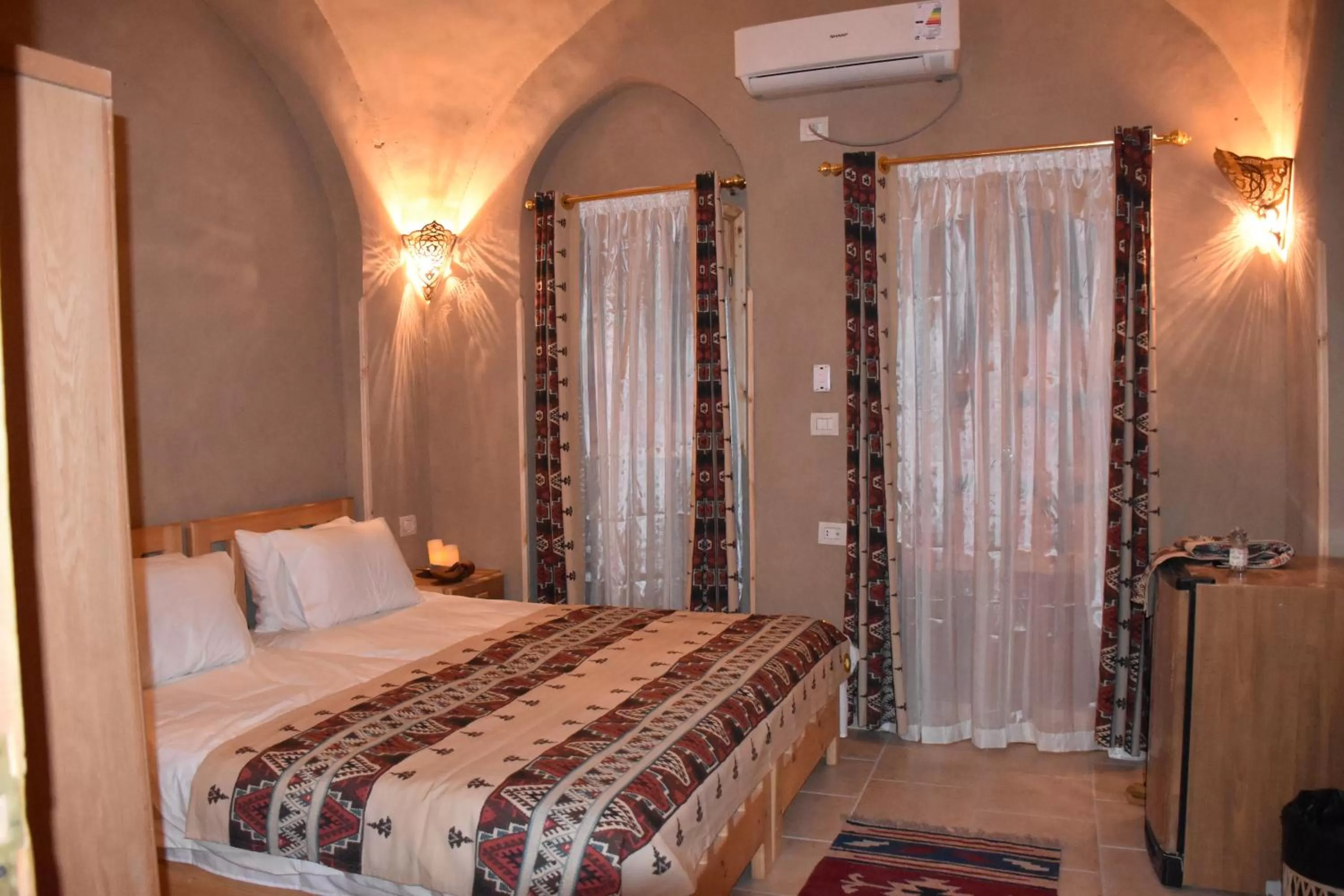 Bed in Embrace Hotel