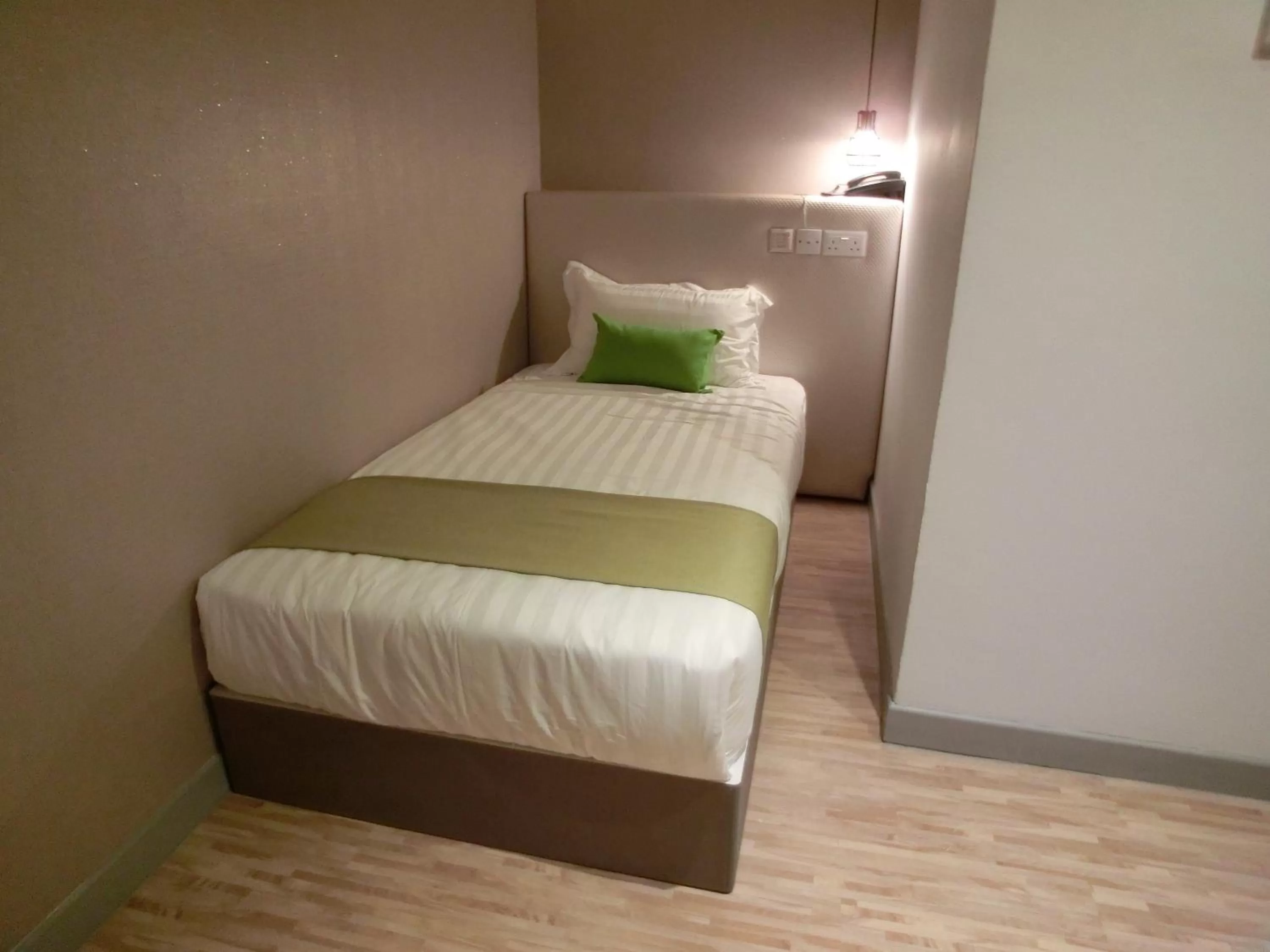 Bed in Champion Hotel