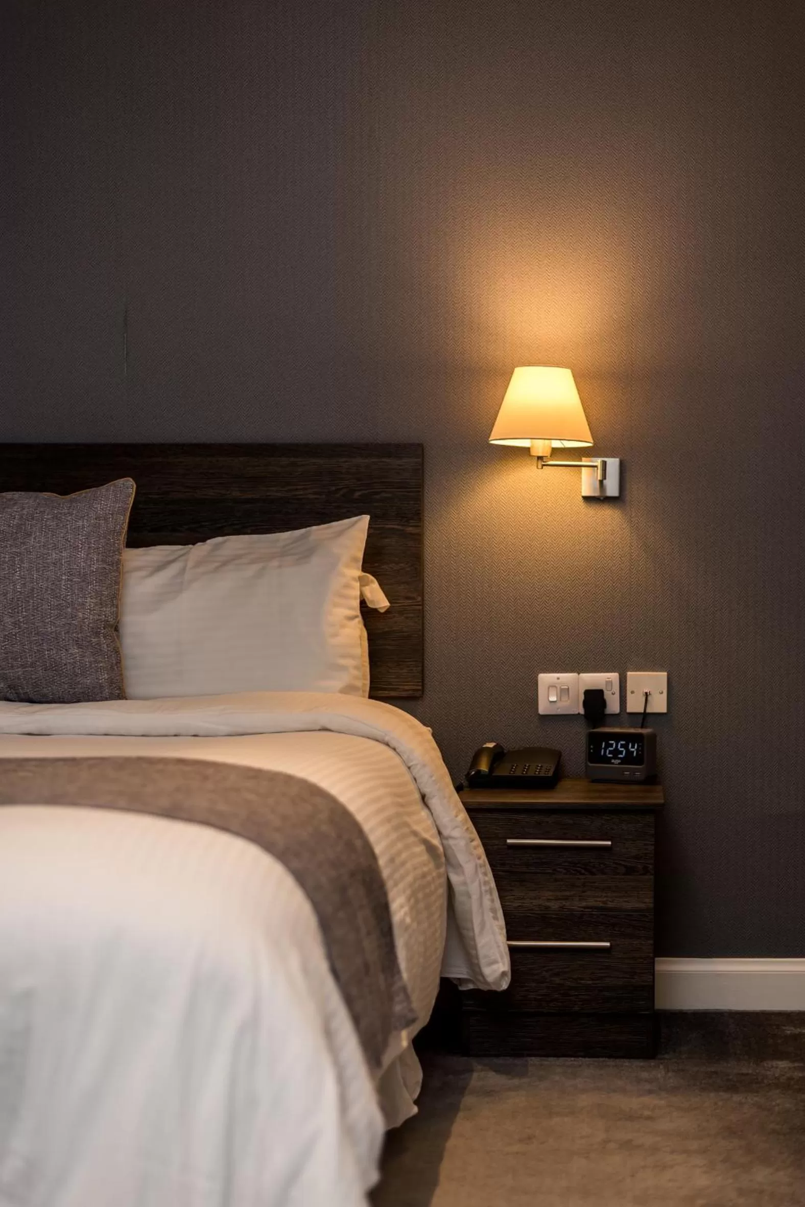 Bed in Grey Harlings Rooms