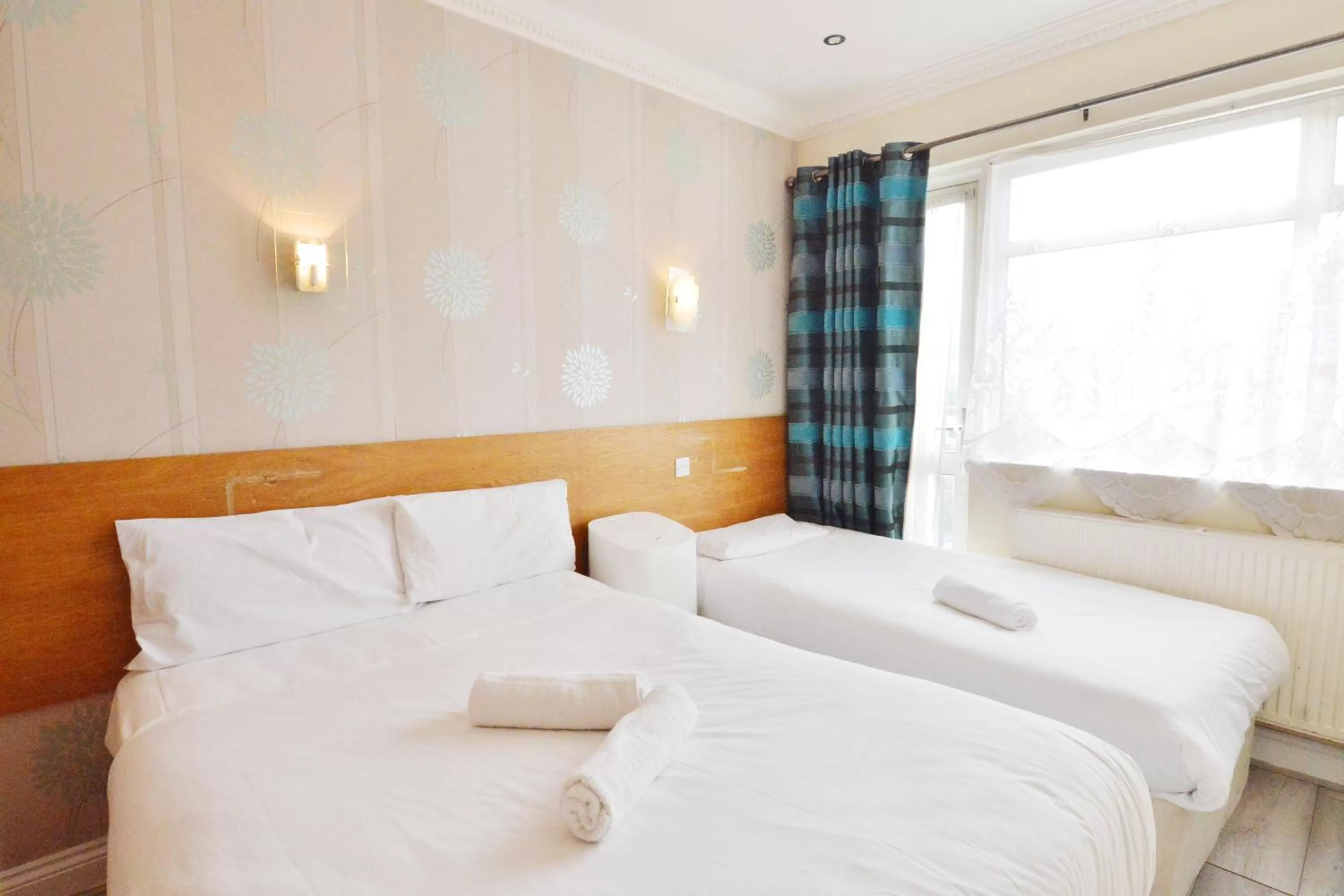 Bed in Anchor Guest House