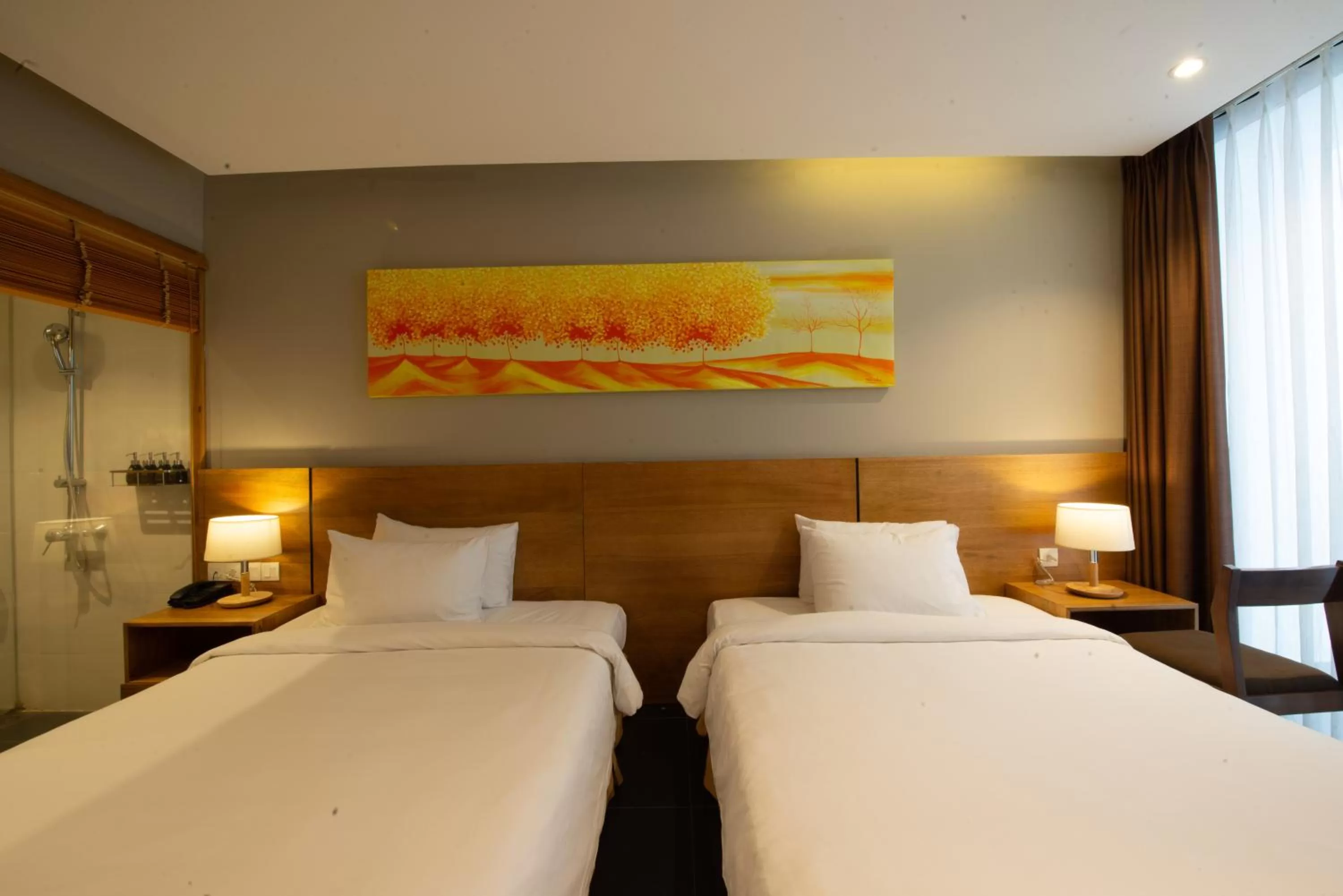 Bed in Maple Hotel & Apartment