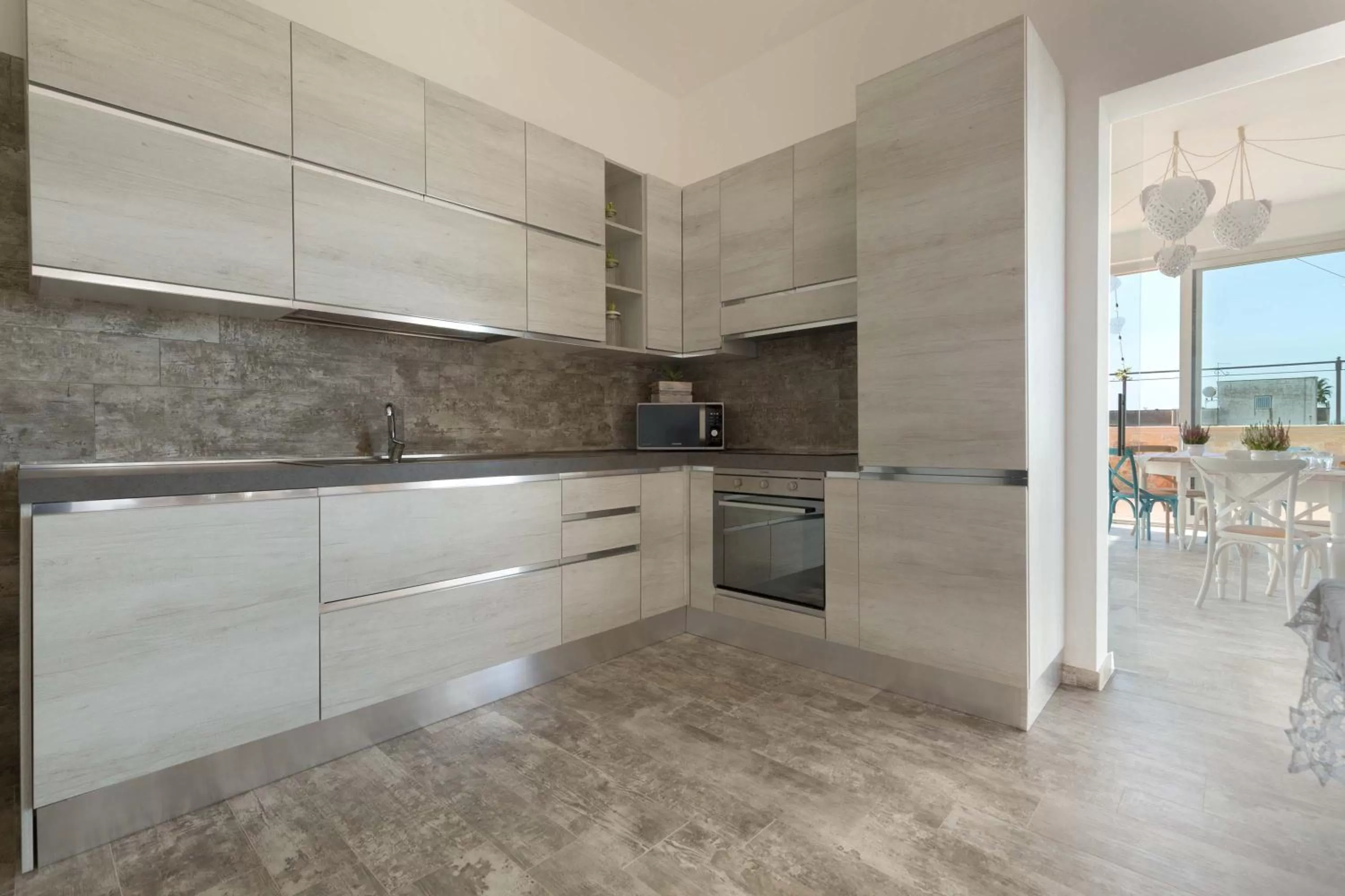 Kitchen or kitchenette in B&B Le Radici del Salento Luxury Rooms