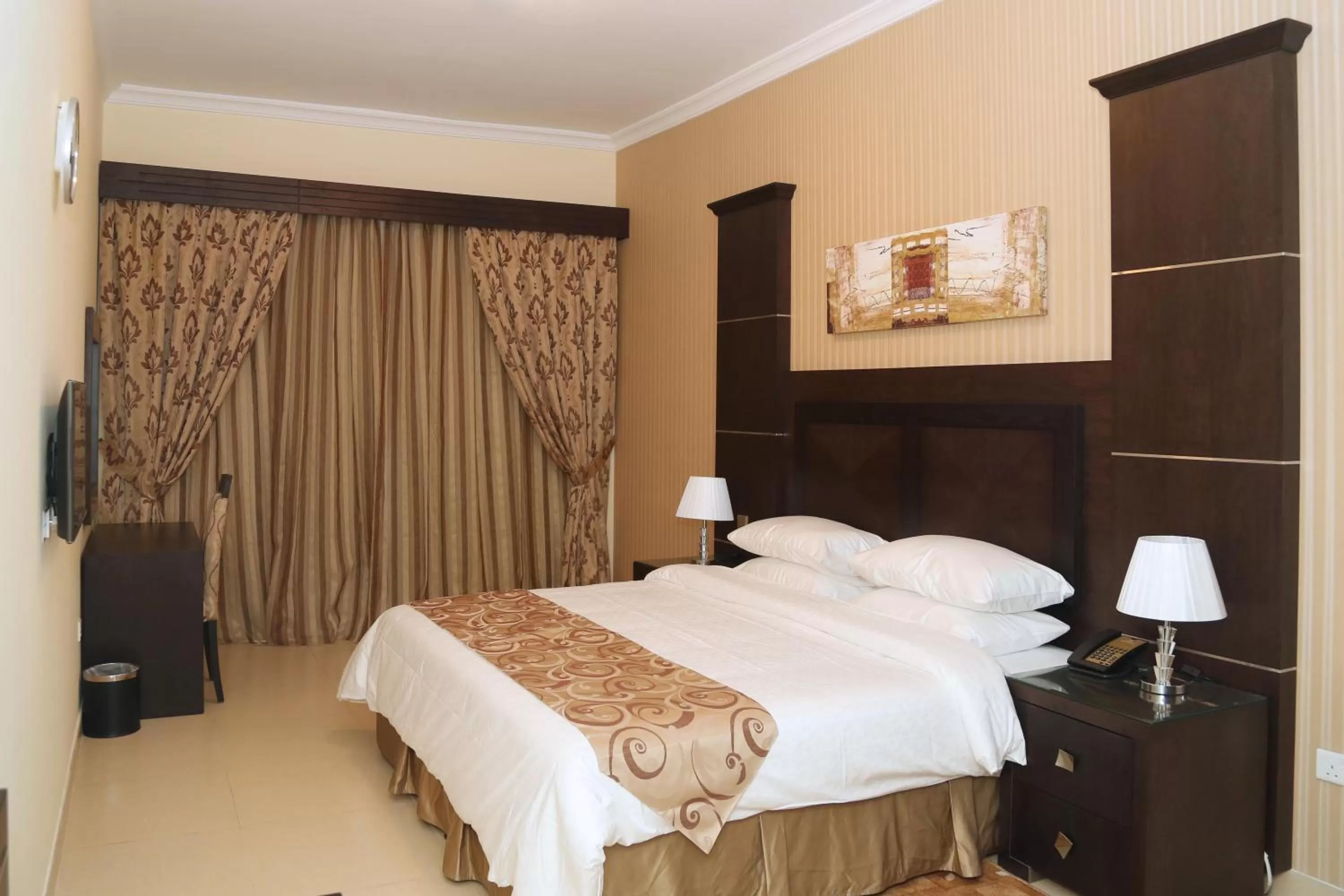 Bed in Ivory Grand Hotel Apartments