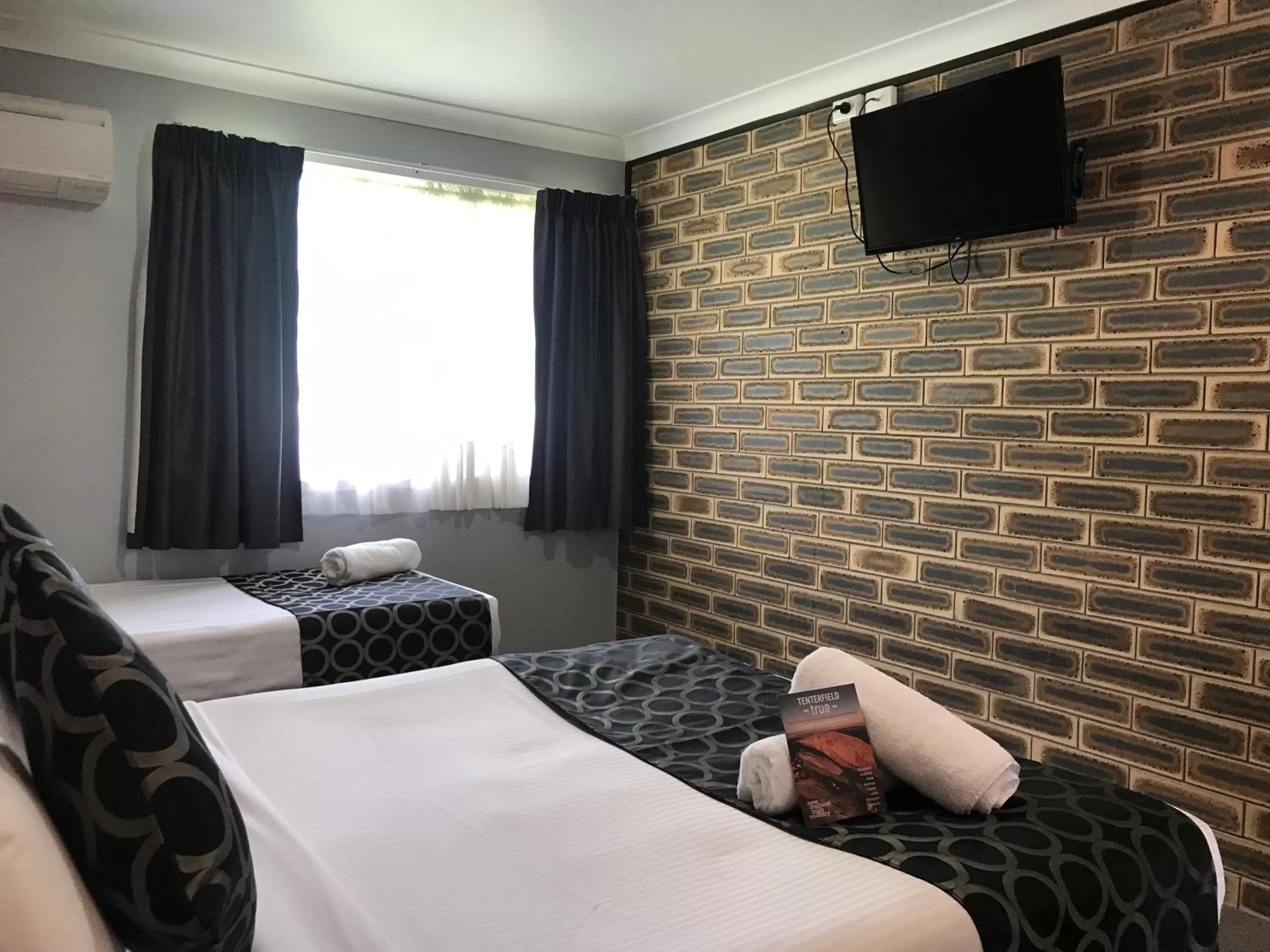 Bed in Jumbuck Motor Inn