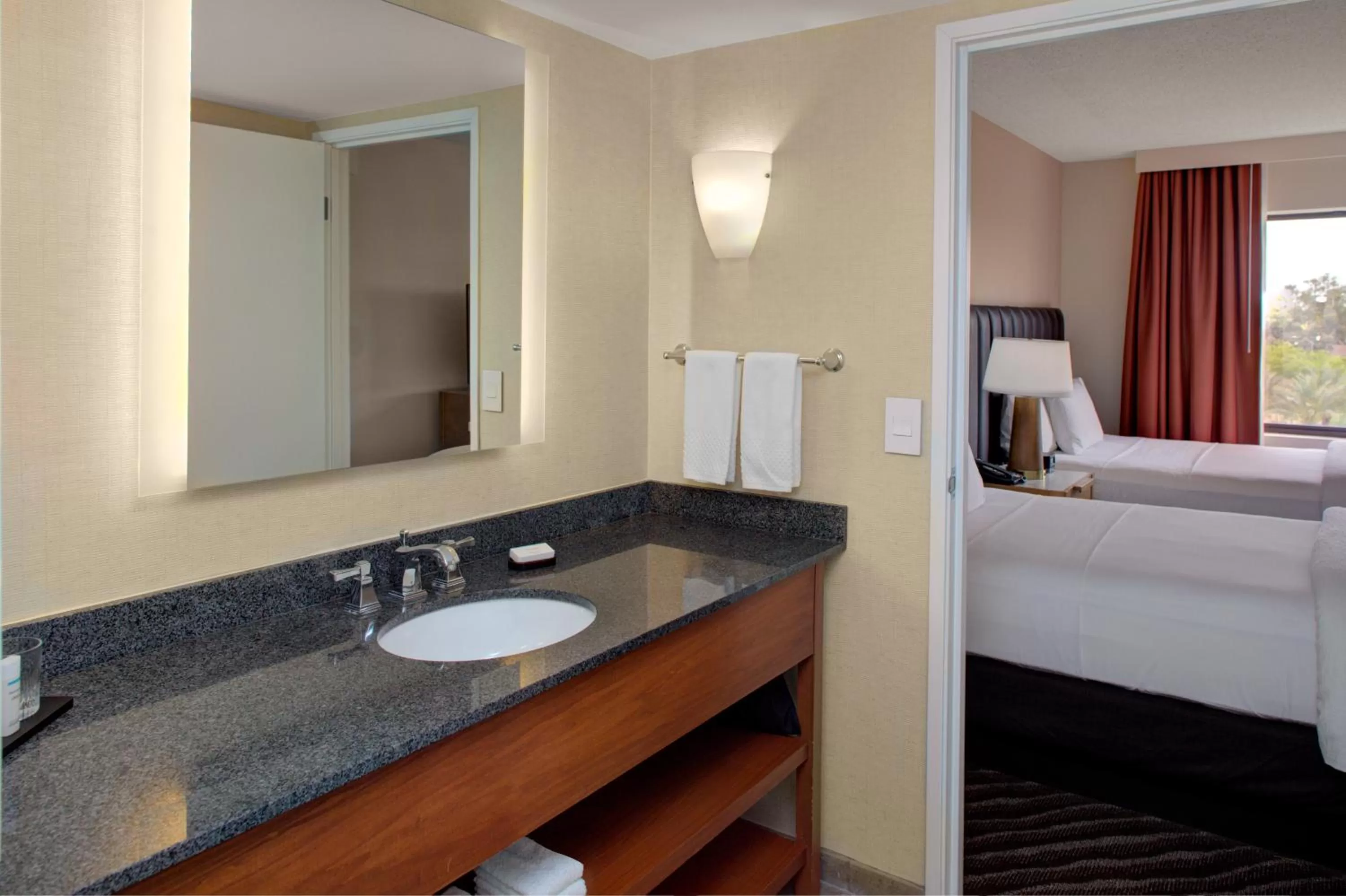 Bathroom, Bed in Embassy Suites by Hilton Phoenix Scottsdale