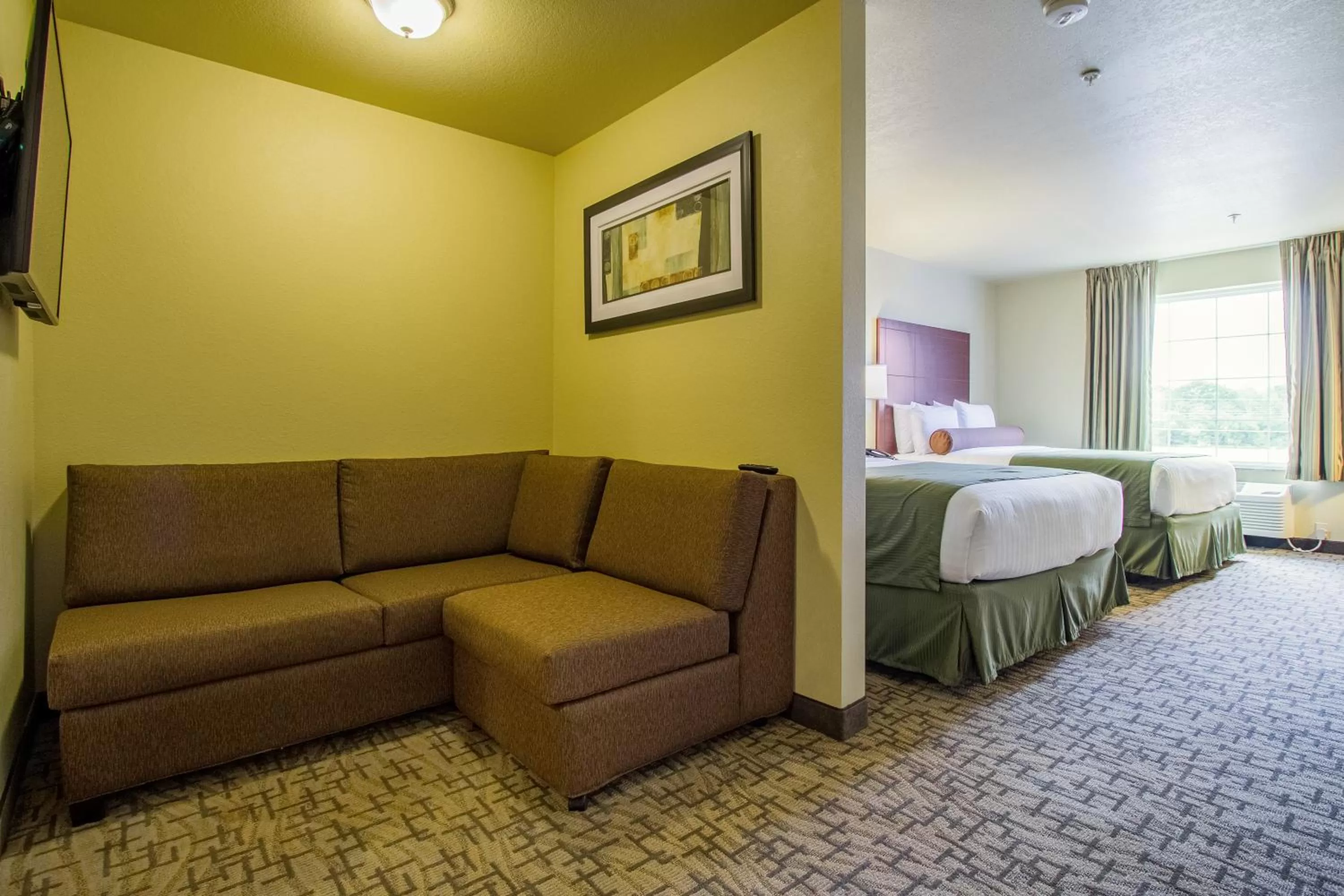 Bedroom, Bed in Cobblestone Hotel & Suites - Orrville