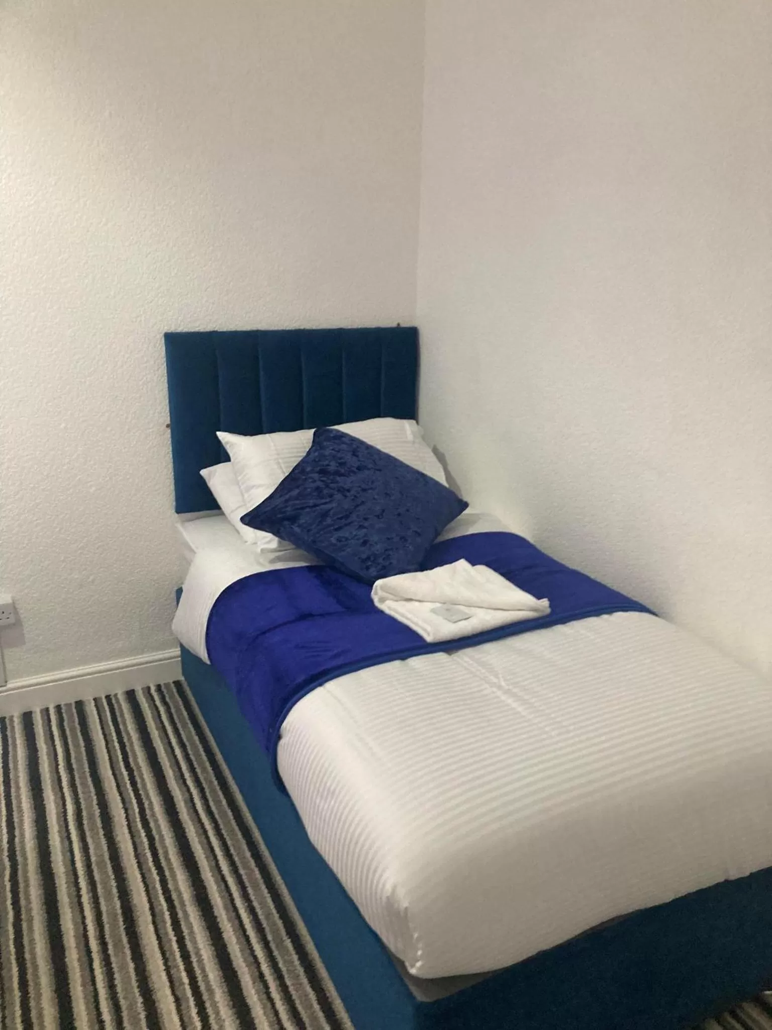 Bed in The New Astoria Hotel