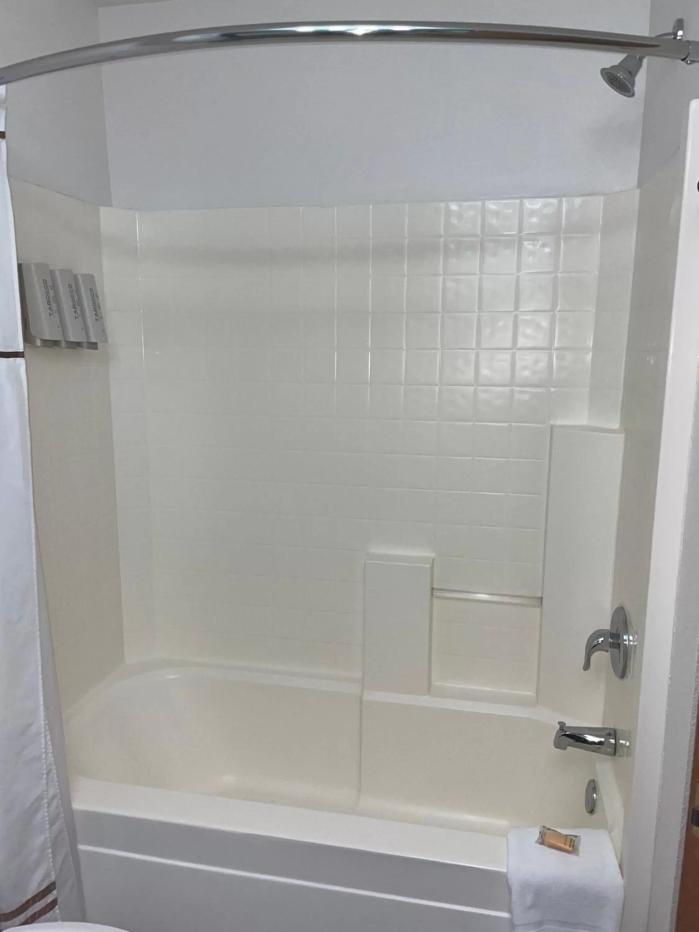 Shower in Boothill Inn and Suites