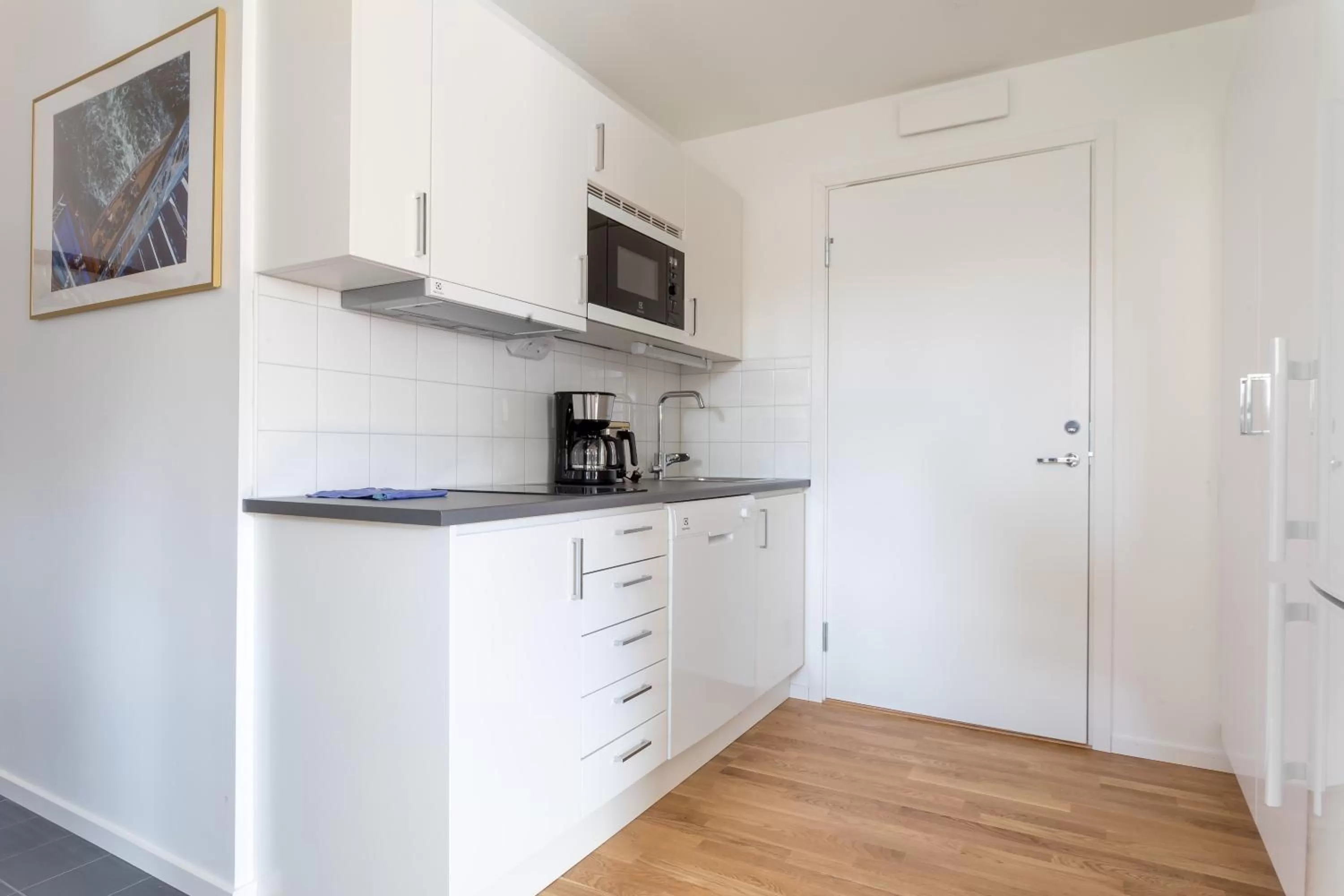 Kitchen or kitchenette in ApartDirect Sundbyberg