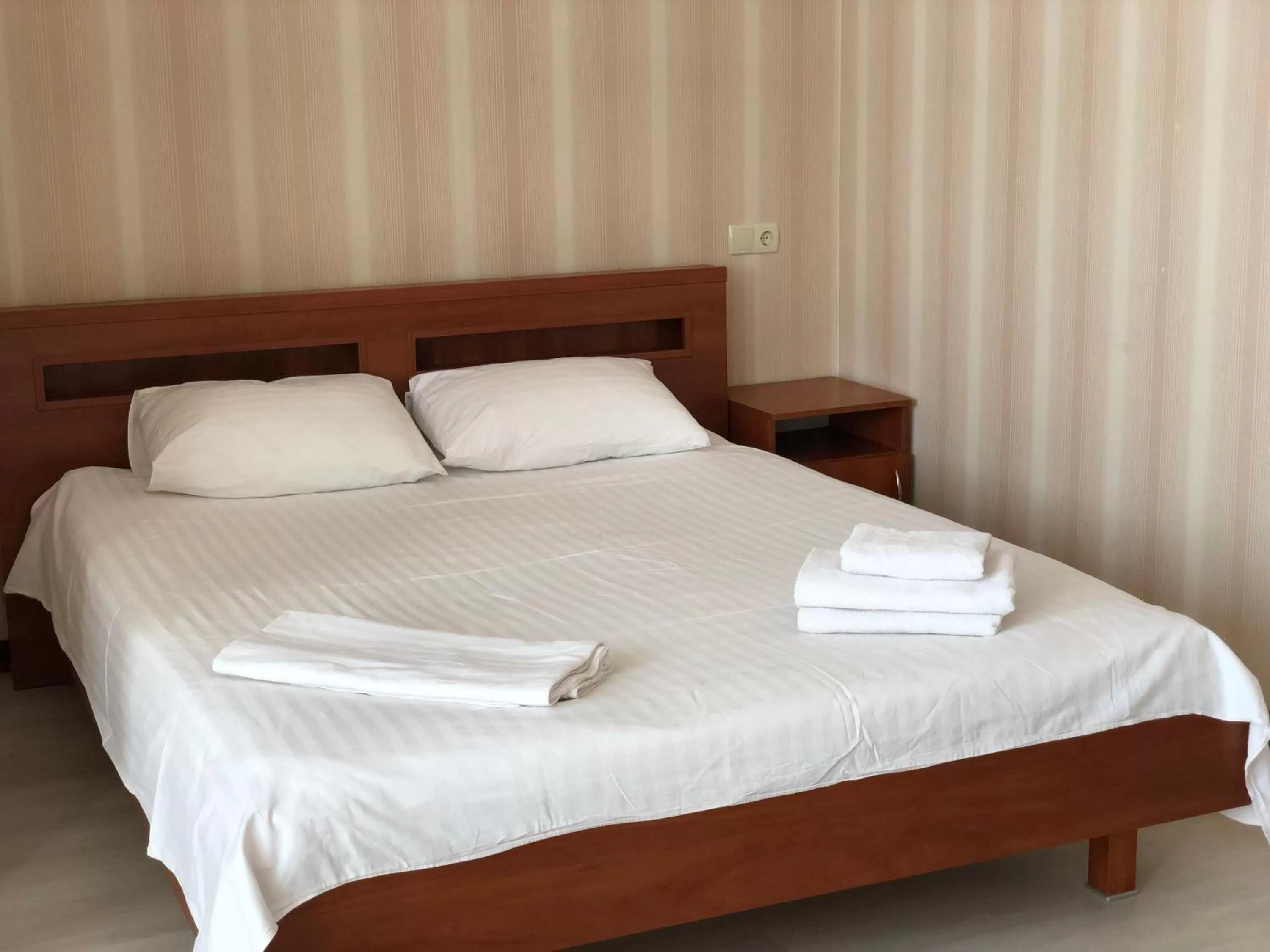 Bed in Zhuliany City Hotel