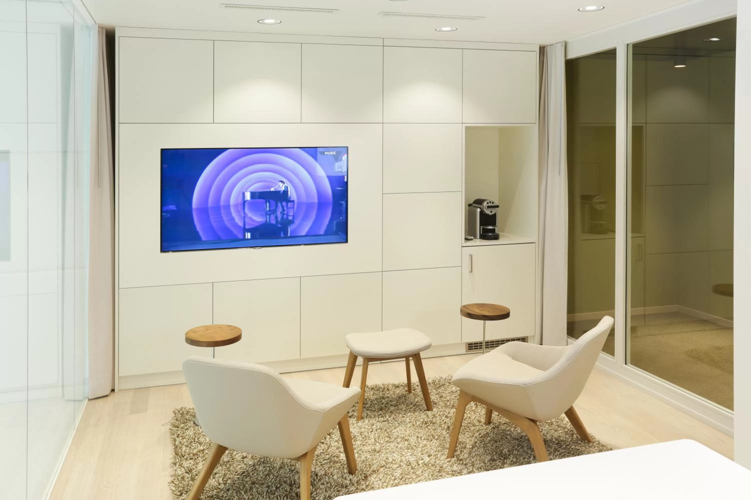 Communal lounge/ TV room in The Passage - Urban Retreat