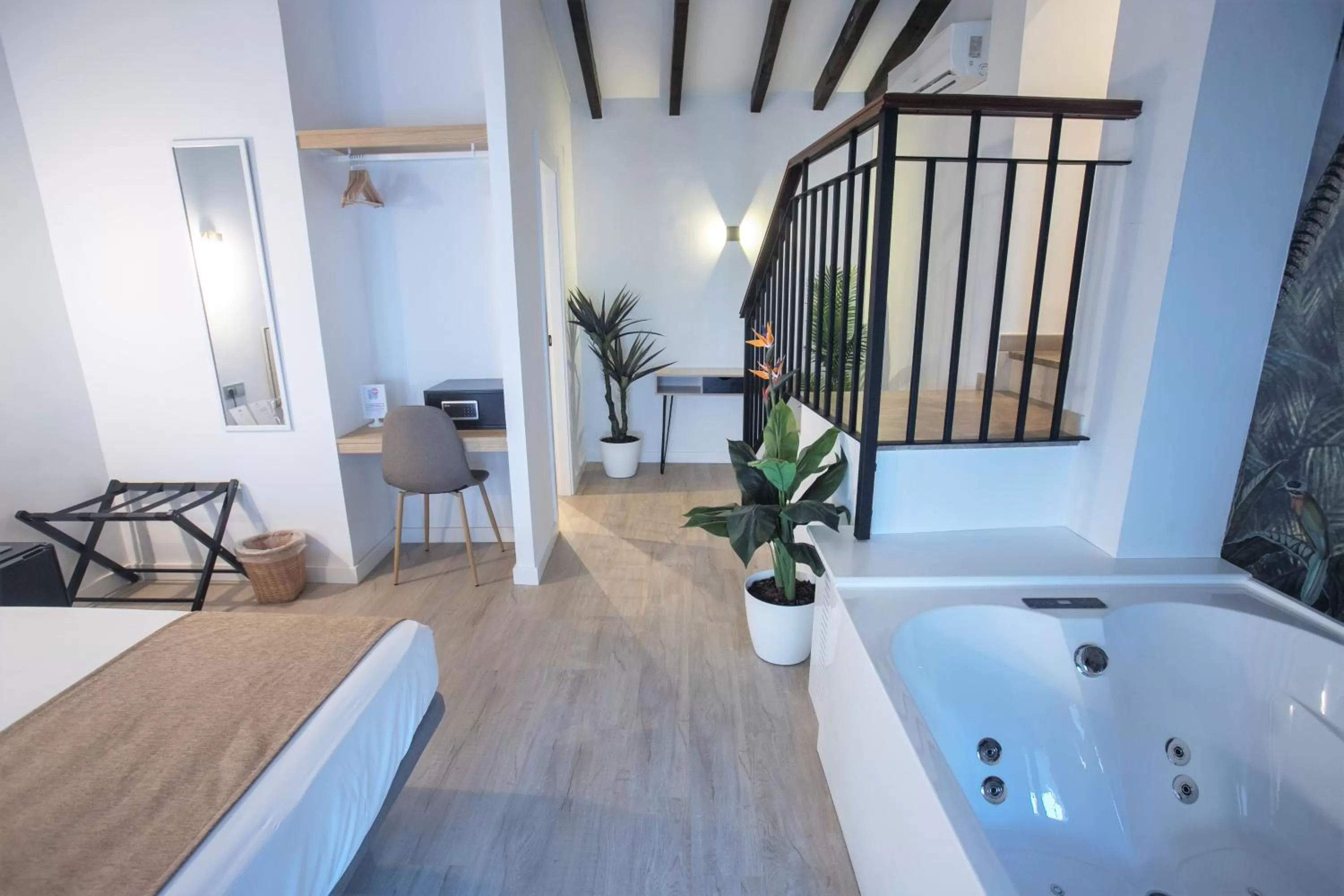 Photo of the whole room, Bed in Vitium Córdoba