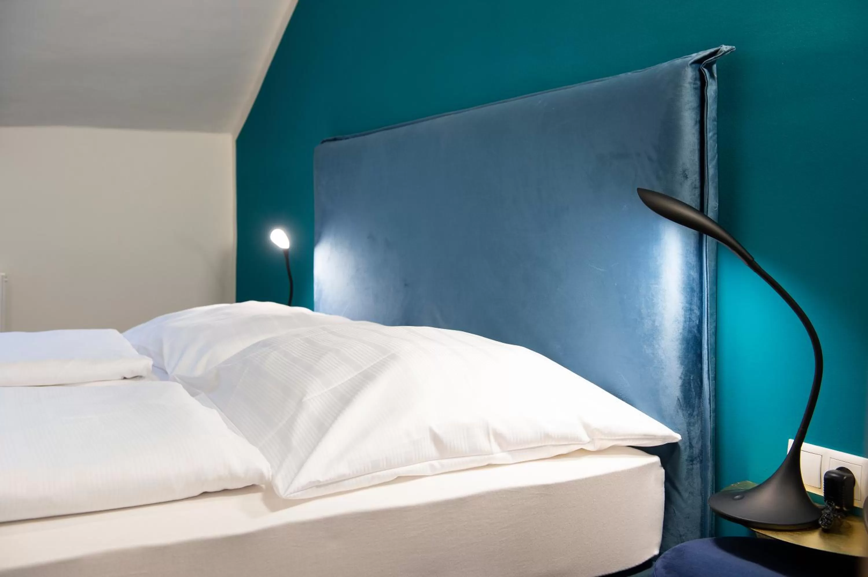 Bed in Blackhome Innsbruck Boutique I contactless check-in