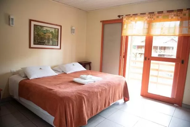 Bed in Pousada da Chacara