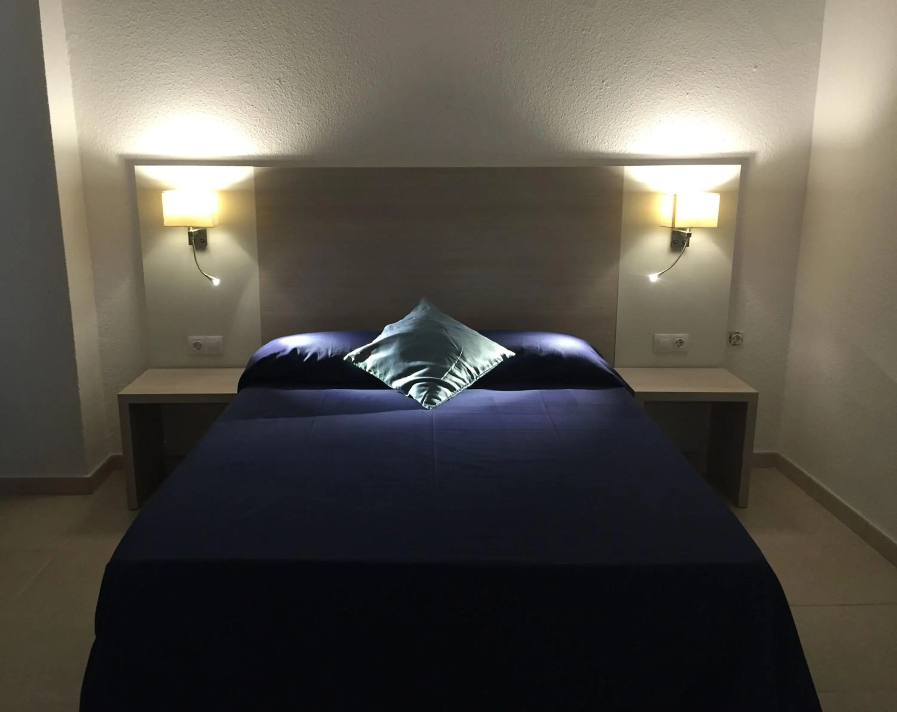 Bed in Hotel Antares