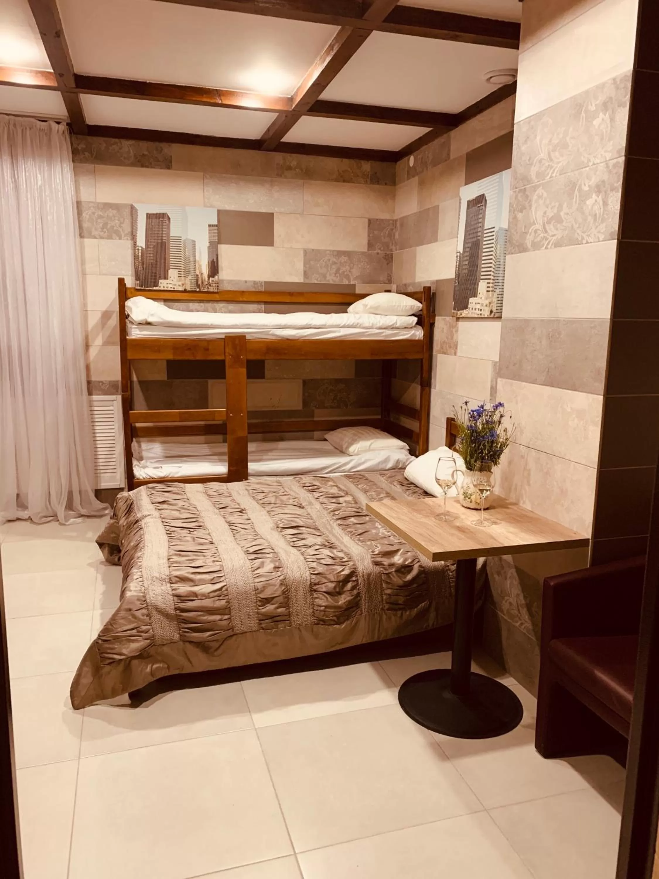 Bed in WINE & ROSE BOUTIQUE HOTEL