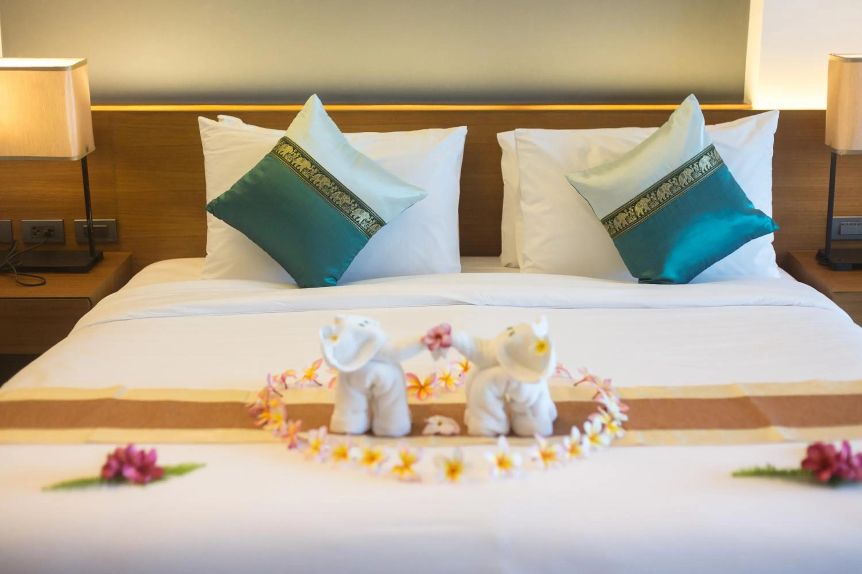 Bed in Chalong Chalet Resort