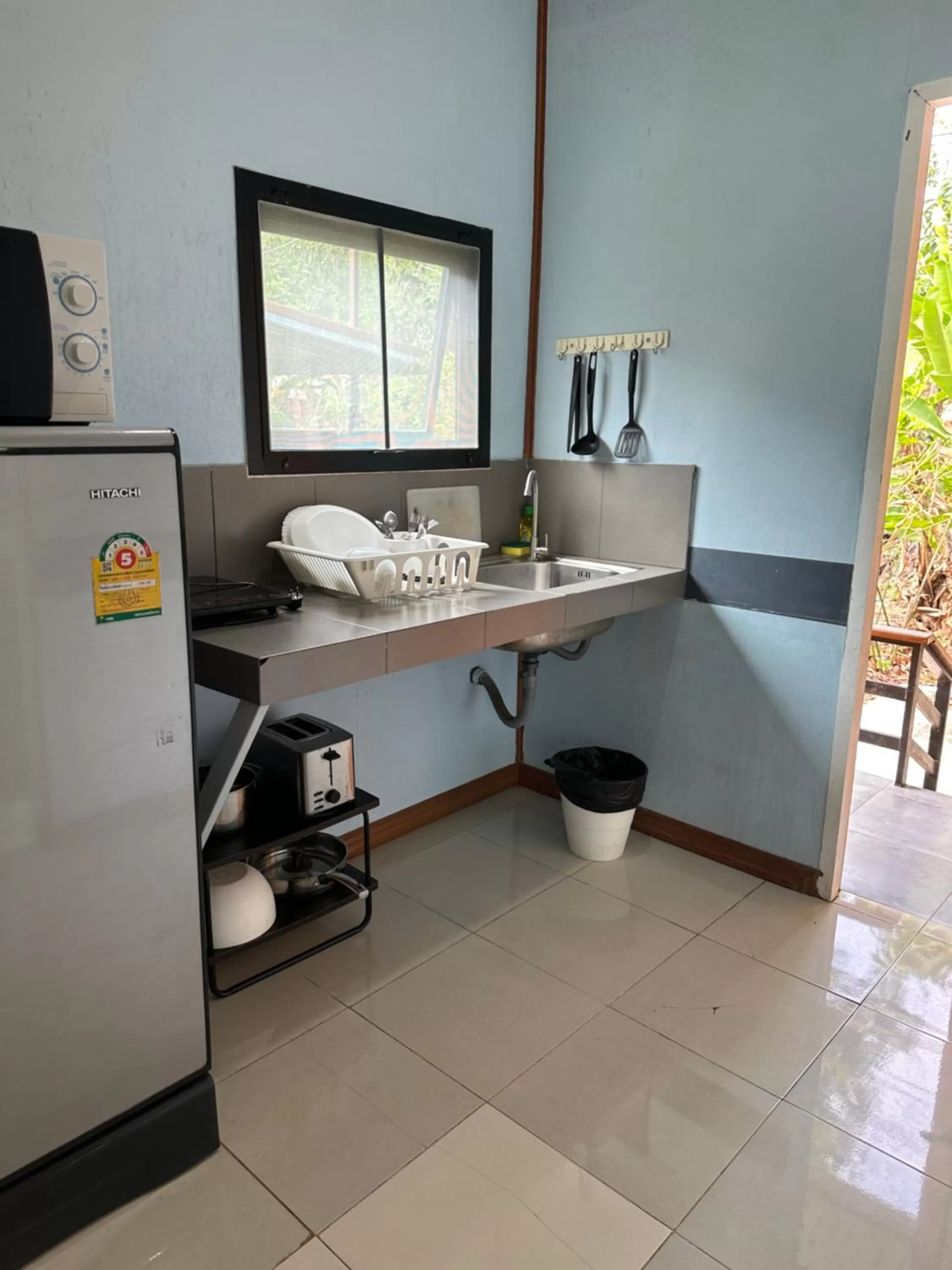 Kitchen or kitchenette in Fine Times Resort