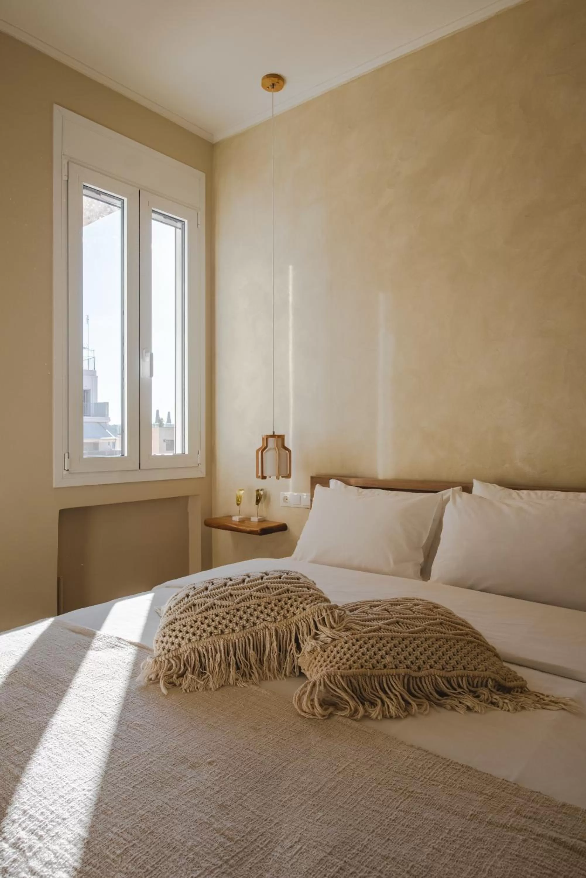 Bed in Living Stone Aparthotel