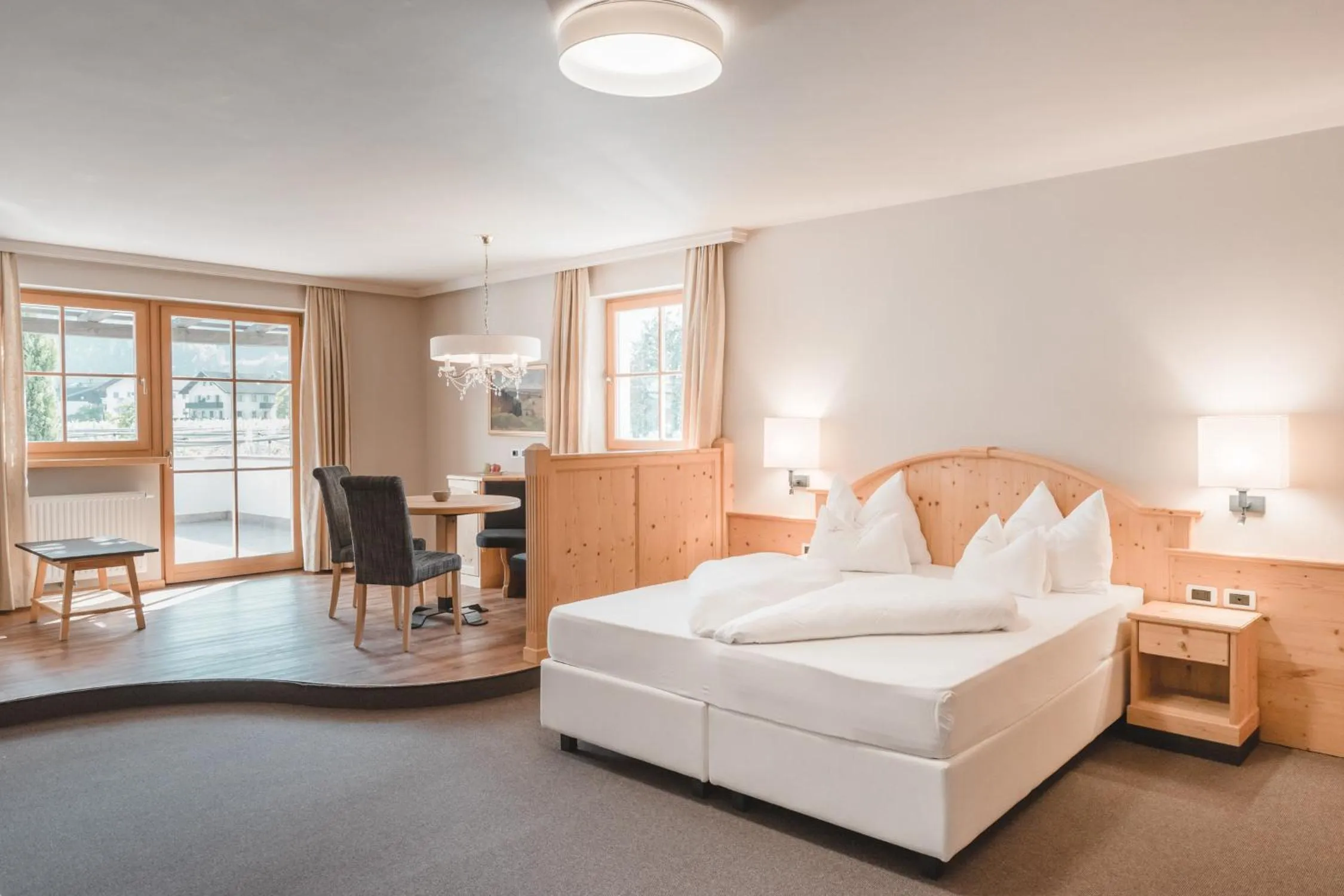Two-Bedroom Suite with Balcony in Hotel Tiefenbrunn Gardensuites & Breakfast