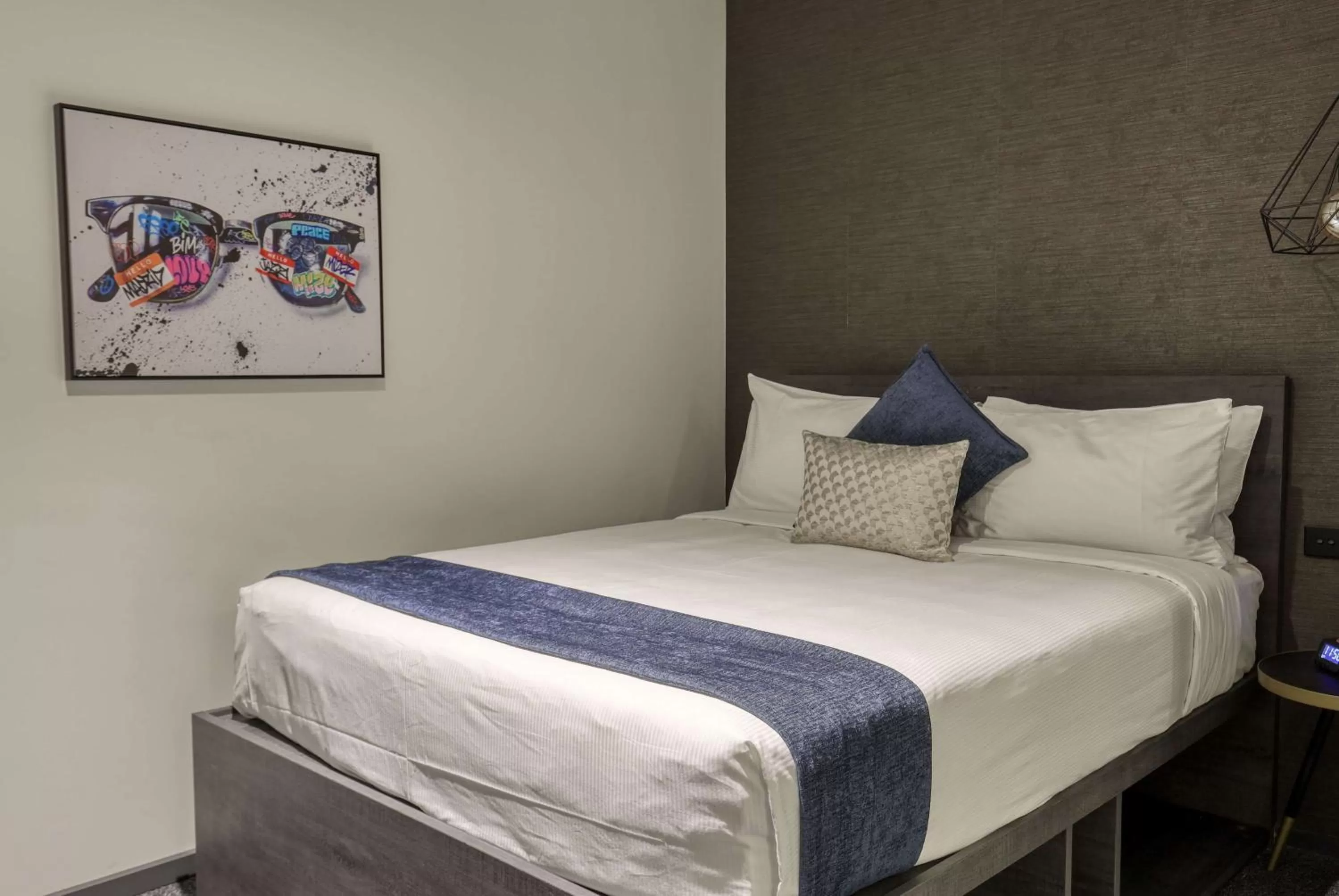 Photo of the whole room, Bed in Microtel by Wyndham Wellington