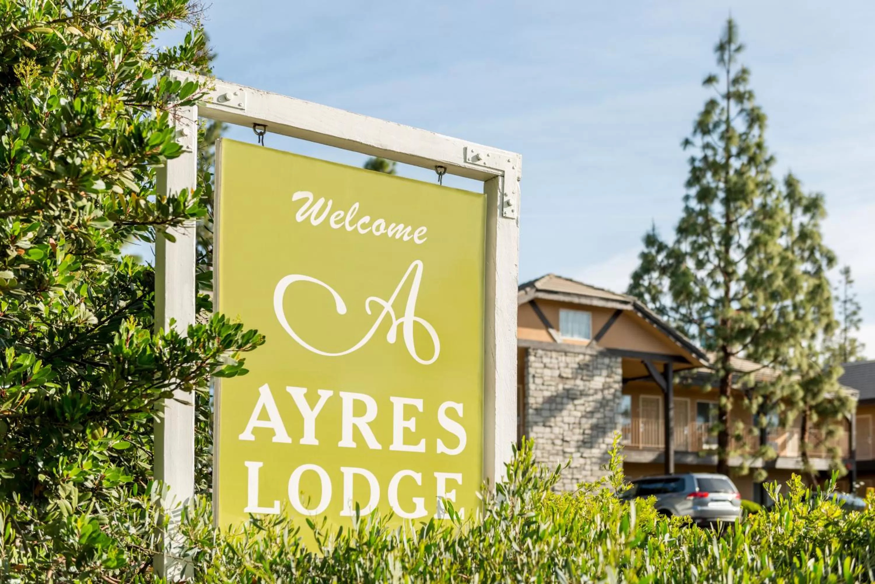 Property logo or sign in Ayres Lodge Alpine