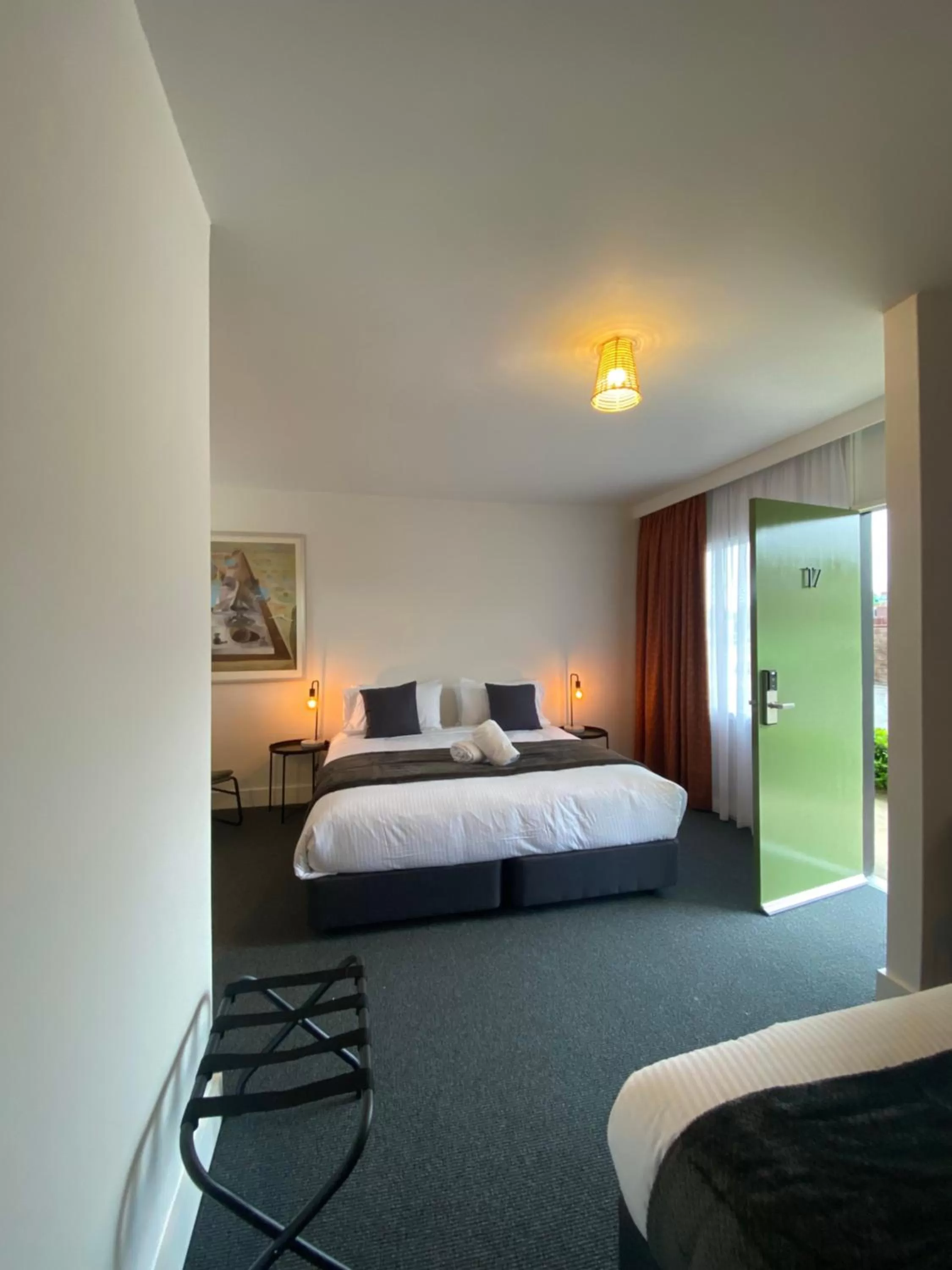 Photo of the whole room, Bed in The Astor Hotel Motel