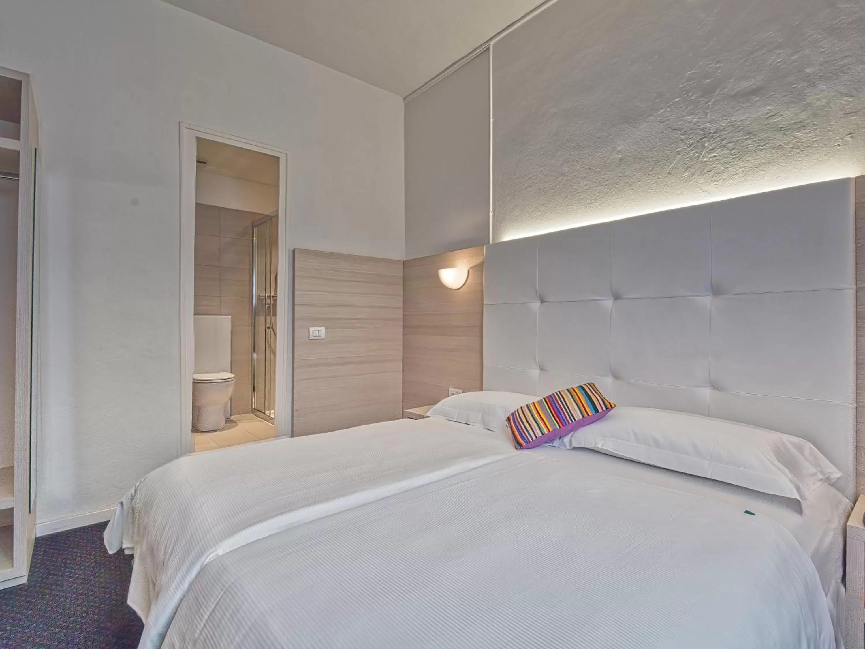 Bed in @ Home Hotel Locarno