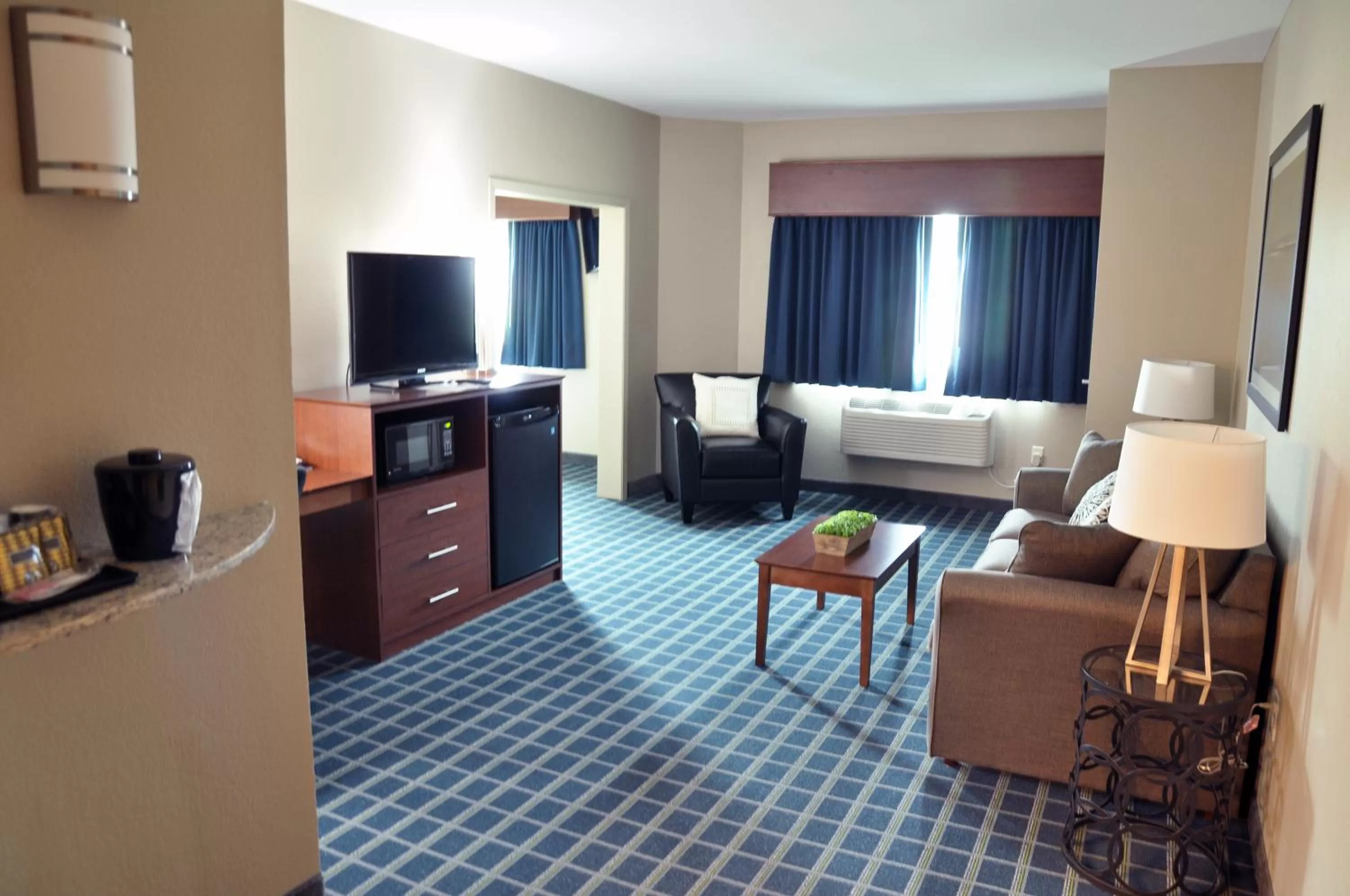 Bed in Brookstone Lodge & Suites