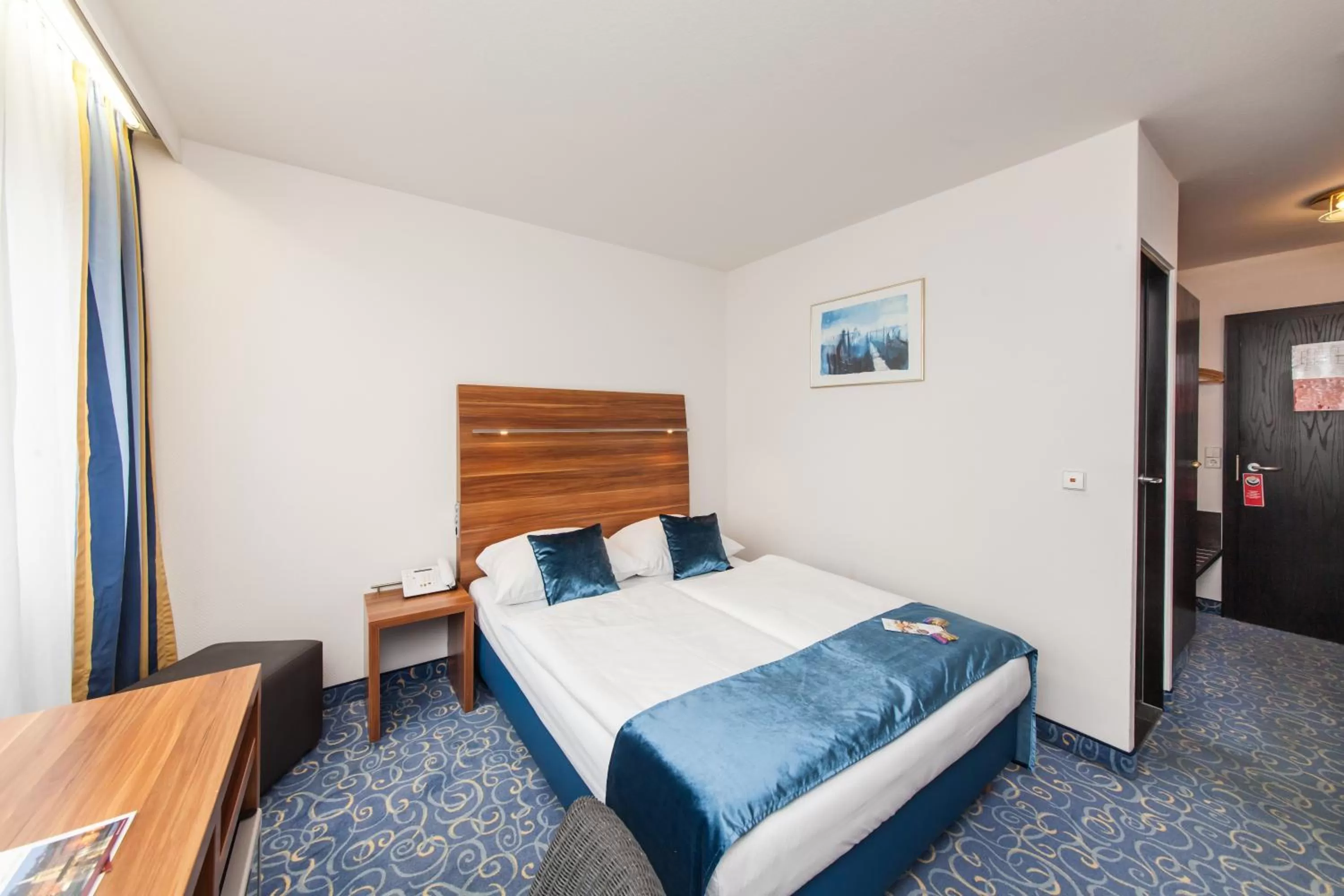 Photo of the whole room, Bed in Hotel Strohgäu