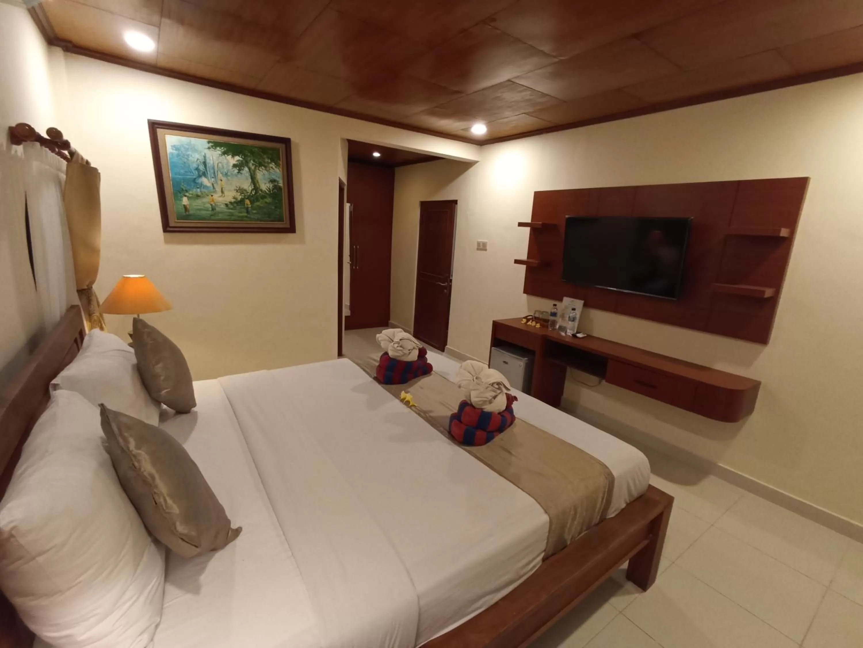 Bed in Kusnadi Hotel