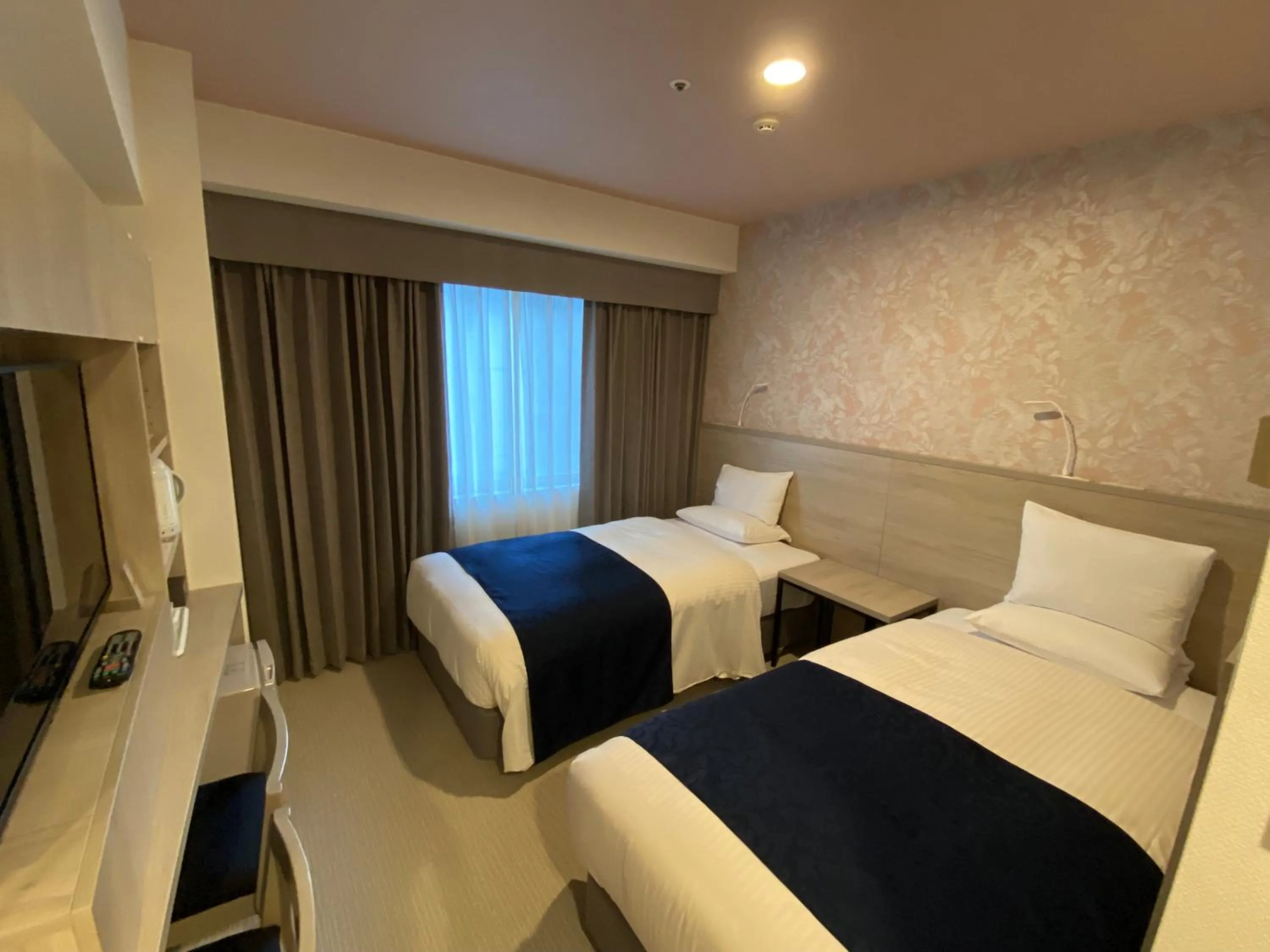 Bed in Hotel Rose Garden Shinjuku