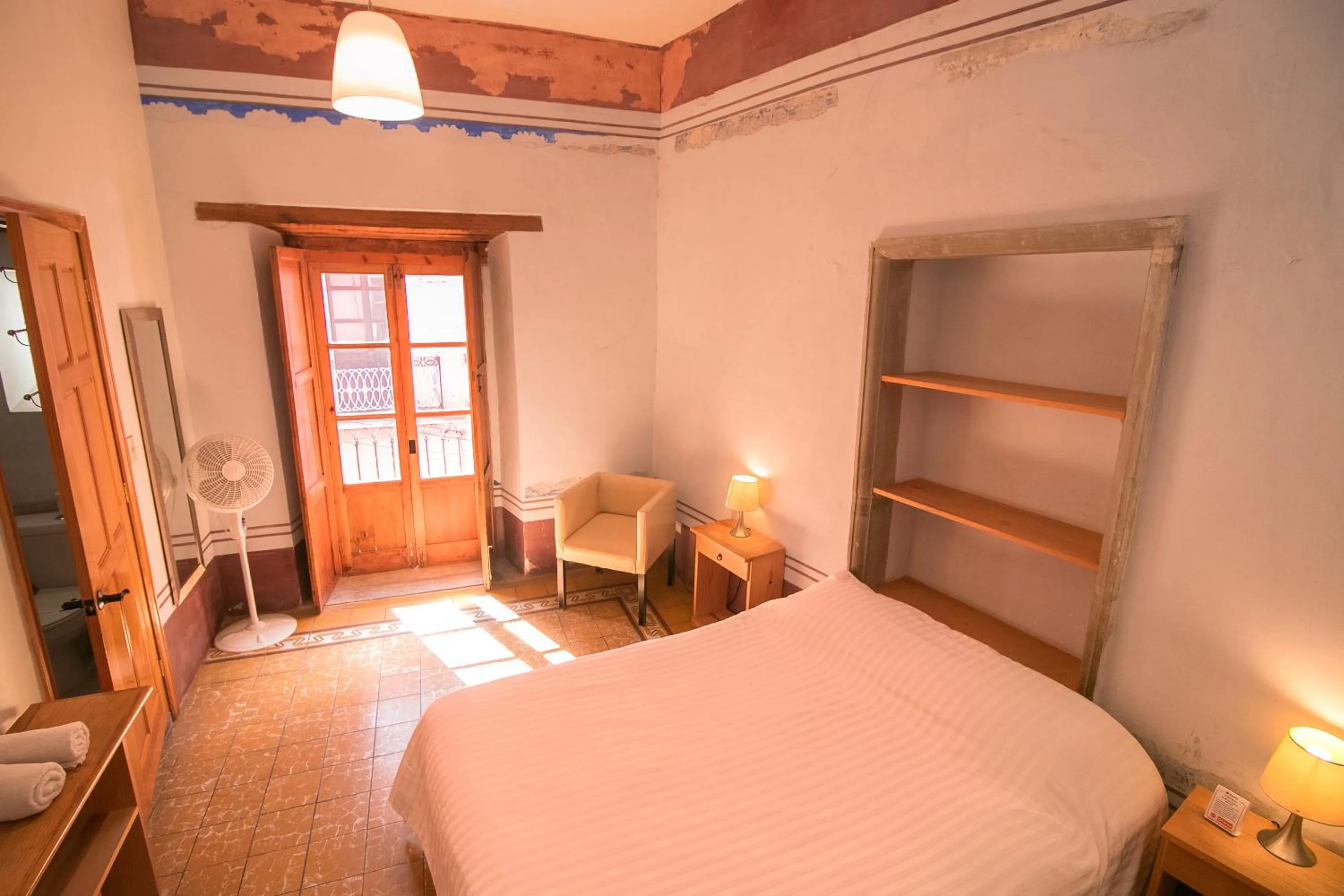 Bed in Hotel Meson Cuevano