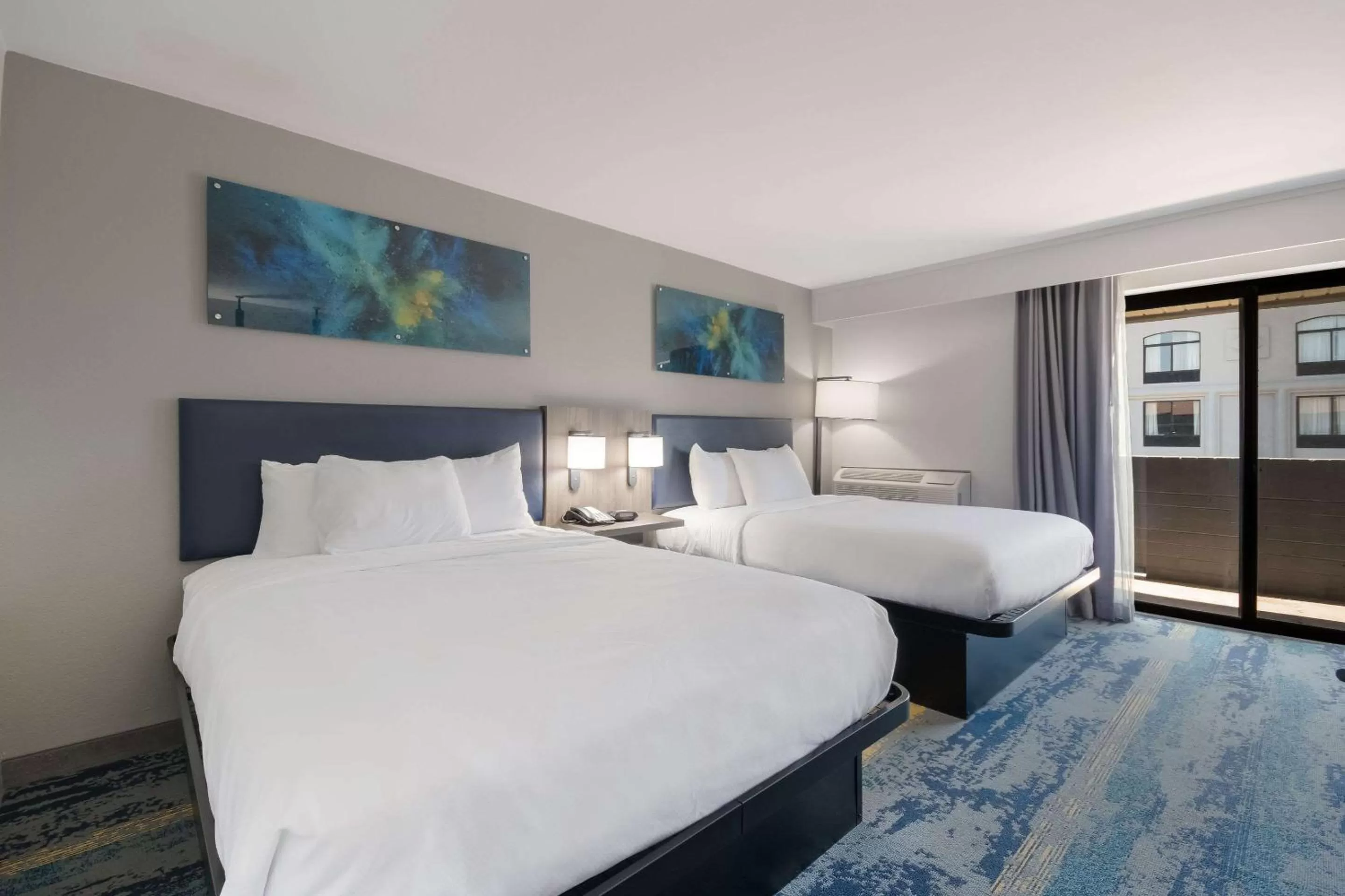 Bedroom in Clarion Pointe OKC Airport