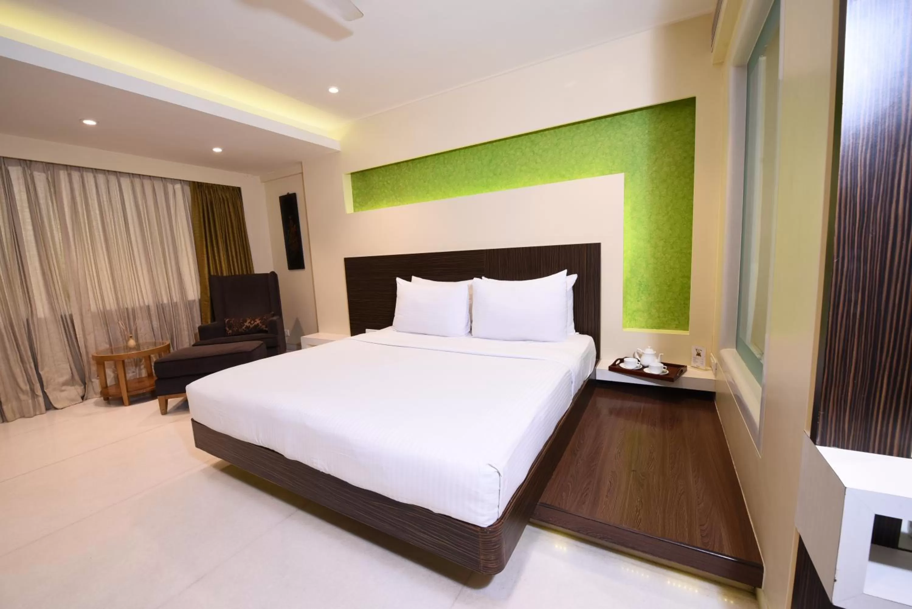 Bed in Hotel Bawa Suites