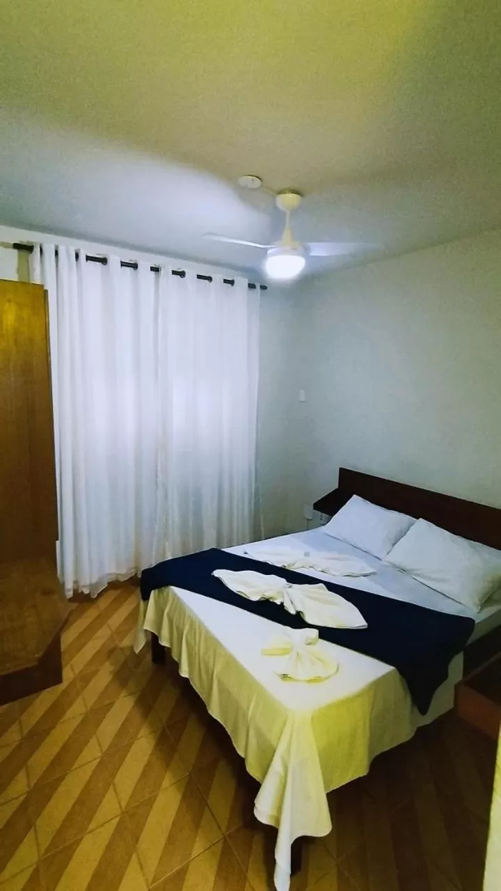 Bed in Pousada Do Suiá