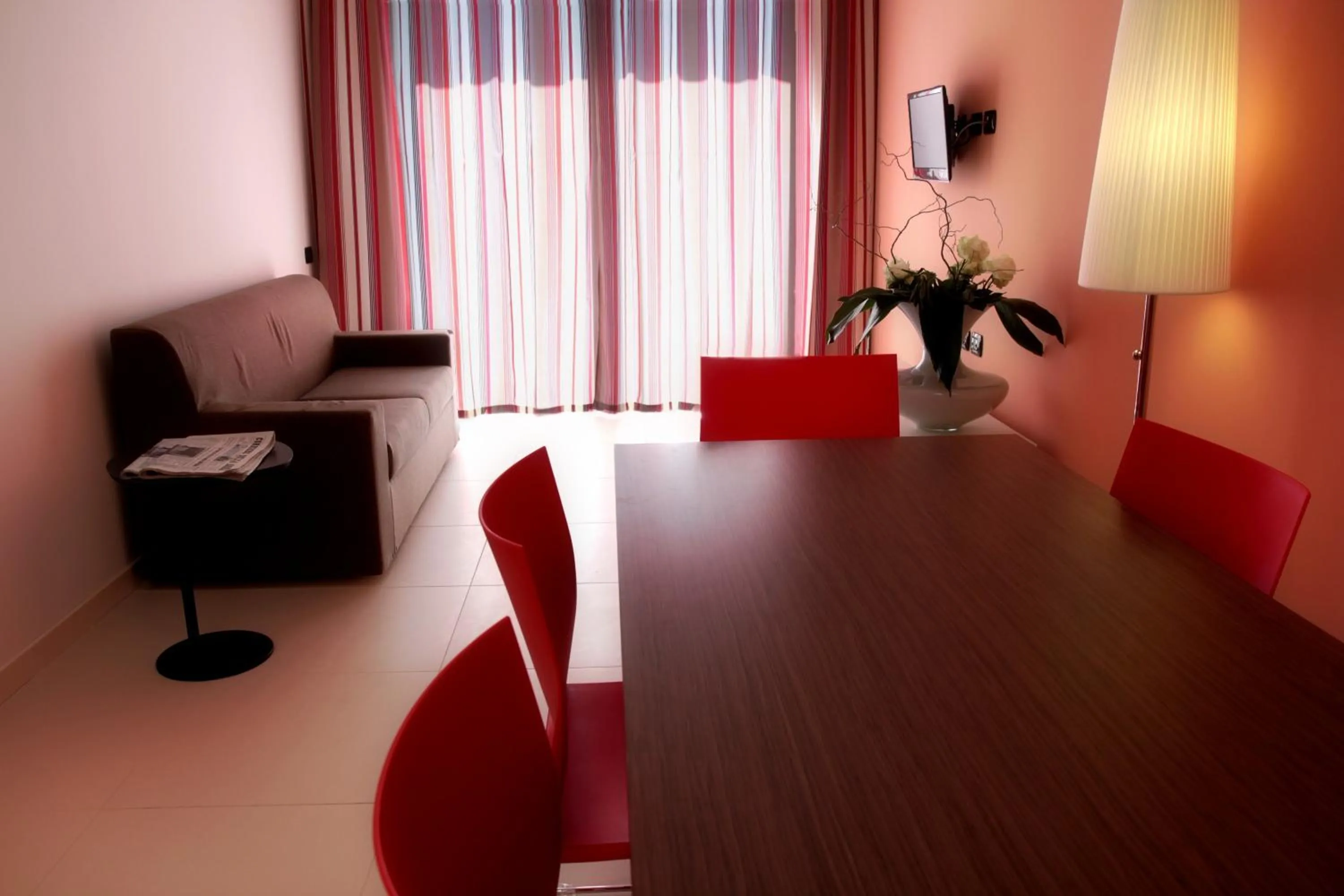 Living room in UNA HOTELS Le Terrazze Treviso Hotel & Residence